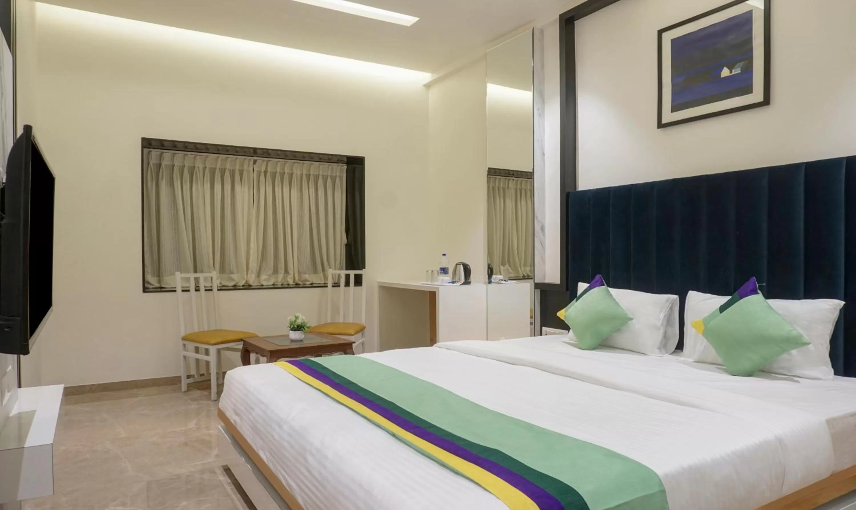 Bed in Treebo The Utsav, Nashik