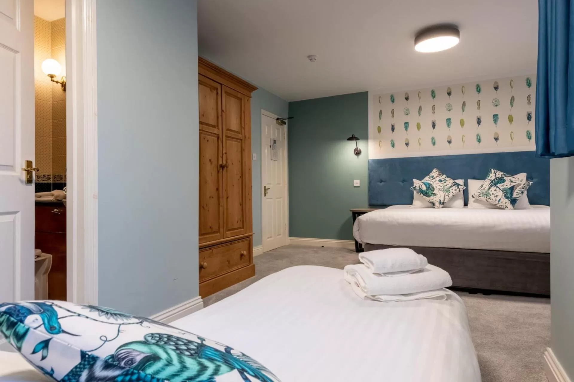 Bed in Wisteria Hotel