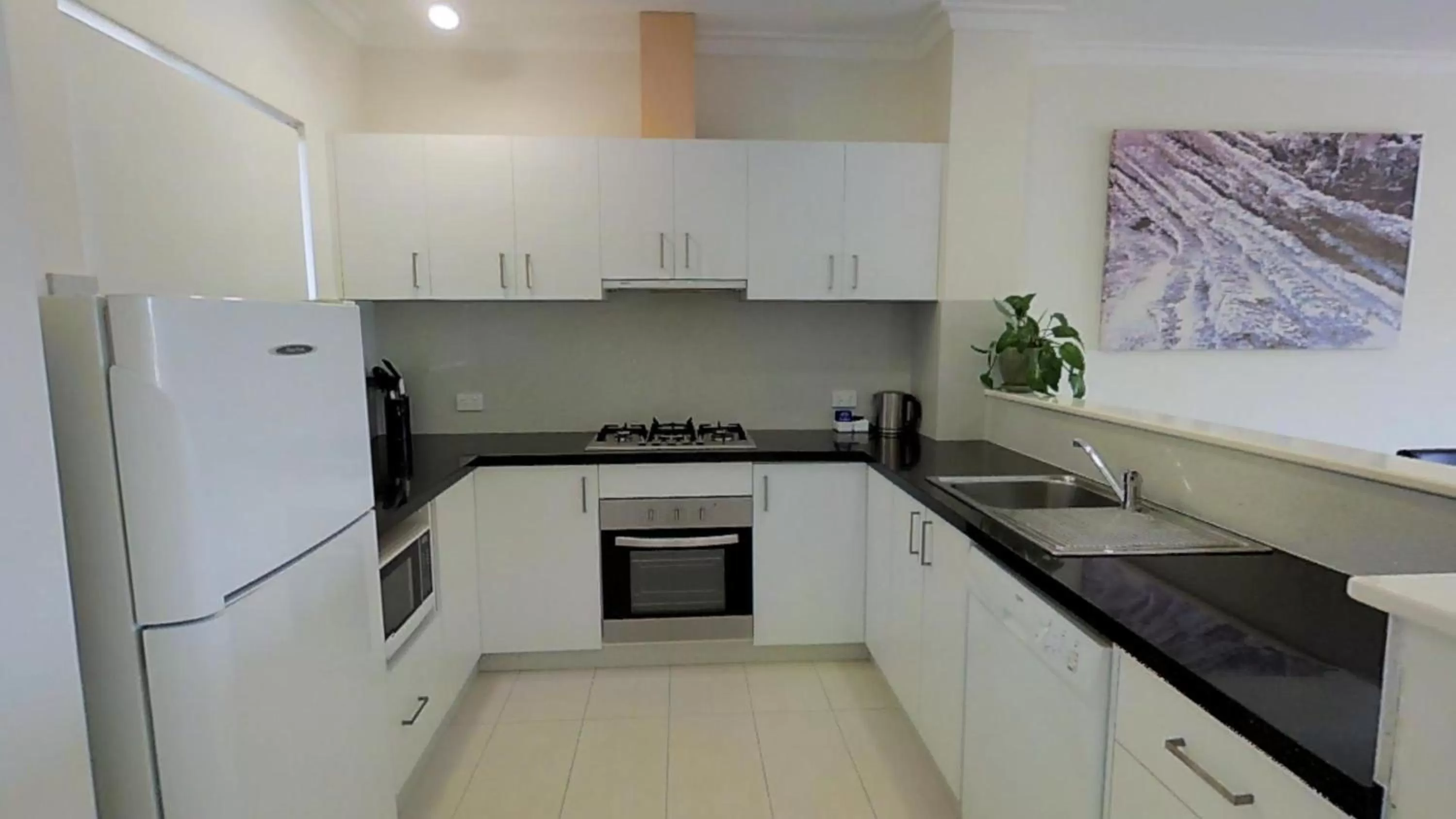 Kitchen or kitchenette in Margarets Beach Resort