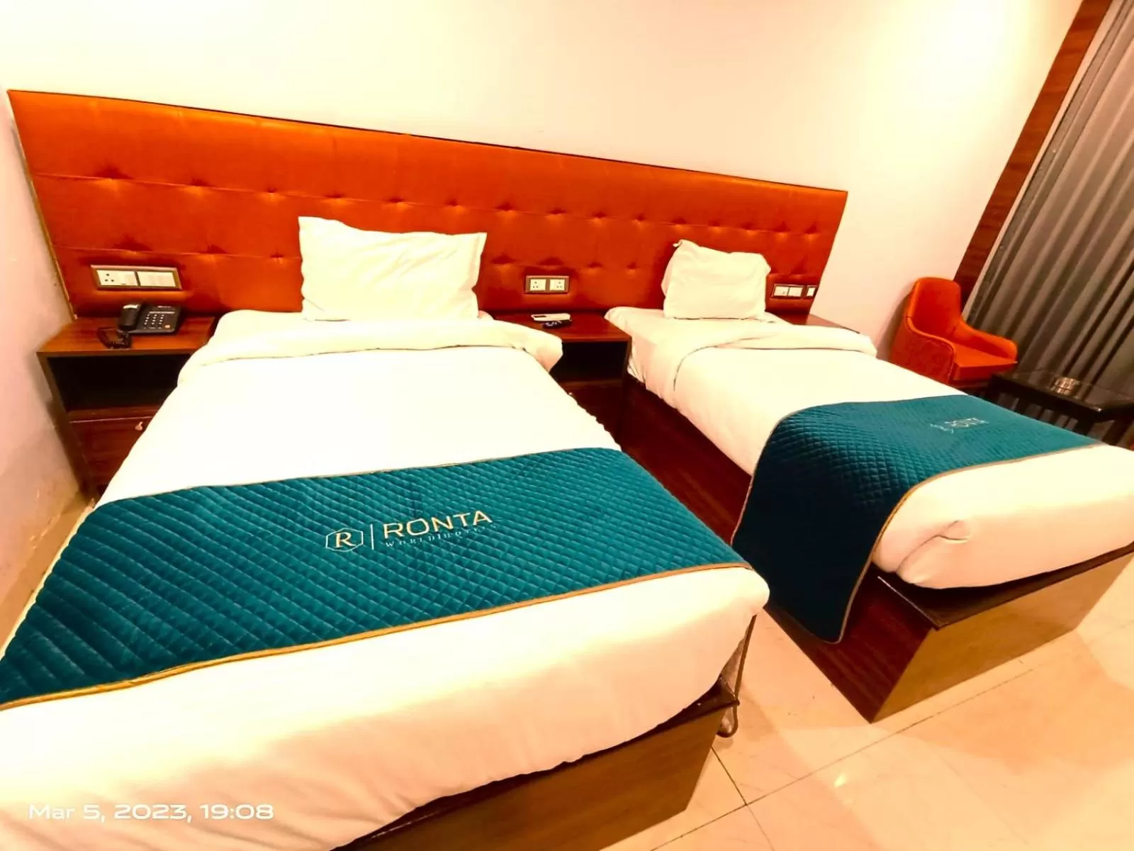 Bed in RONTA WORLD HOTELS