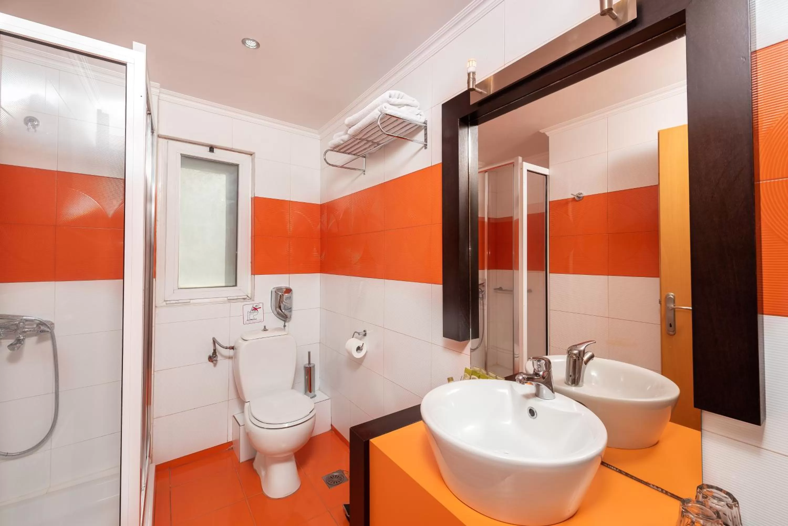 Shower in Heliotrope Hotels