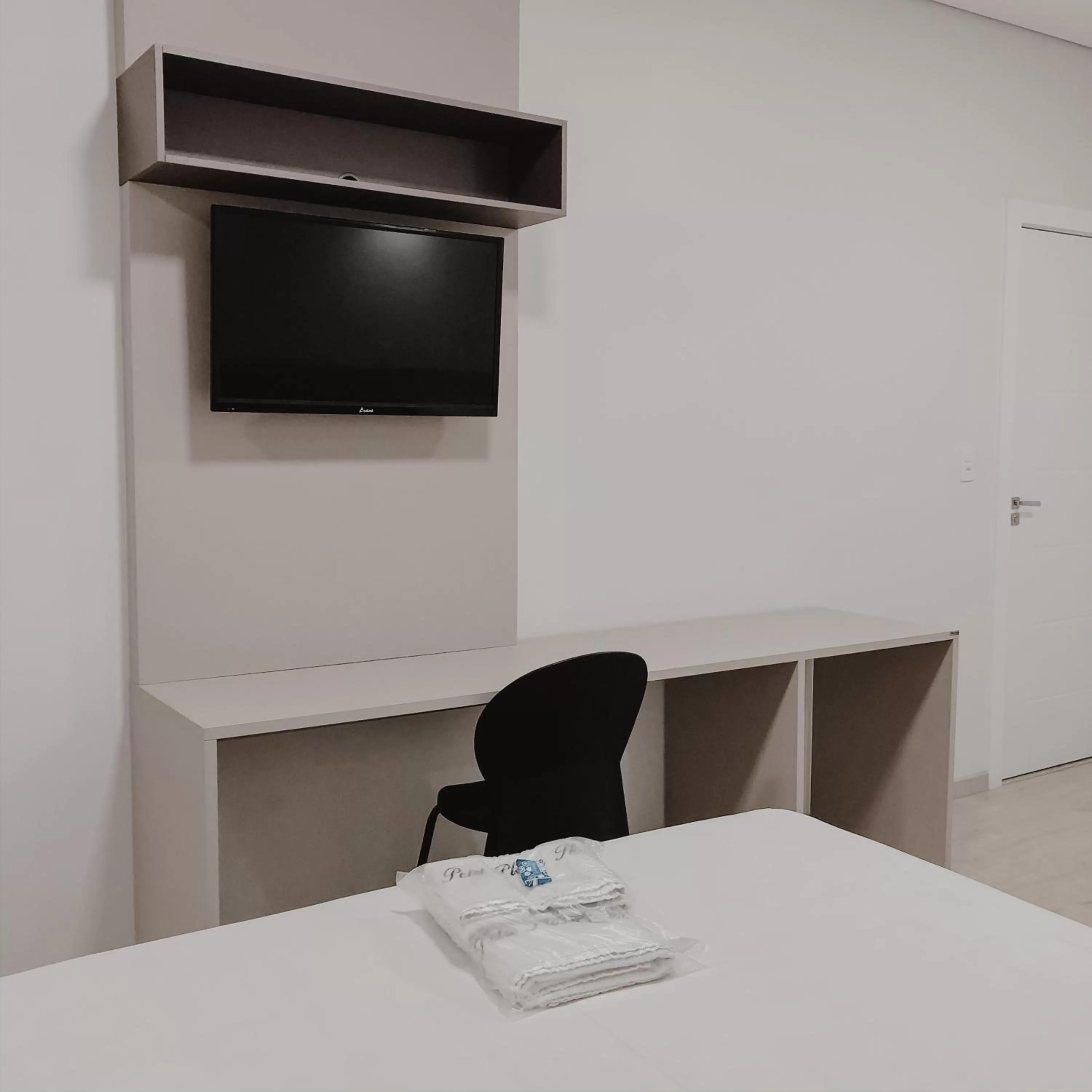 Bed in Petri Plaza Hotel