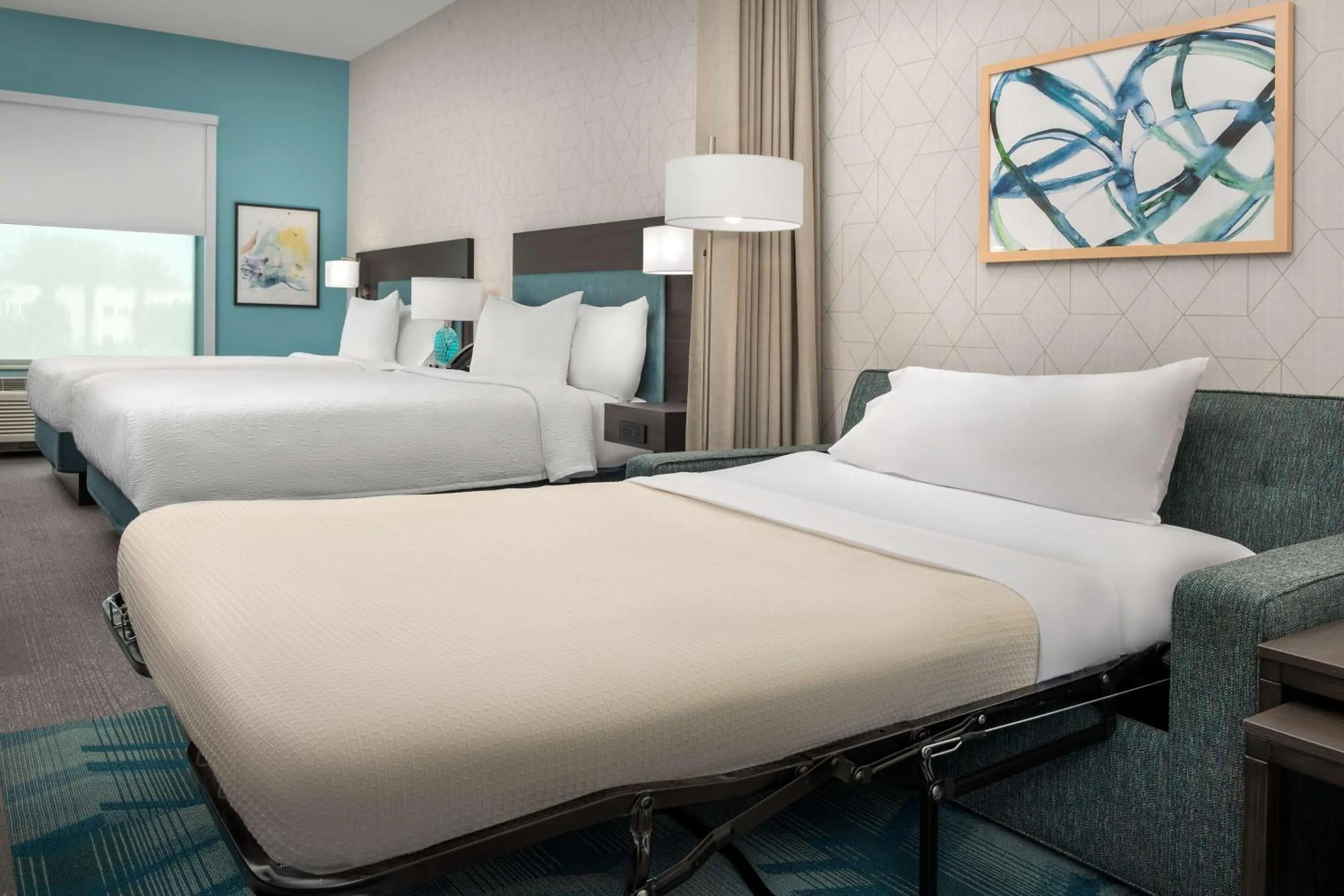 Living room, Bed in Home2 Suites Orlando Southeast Nona