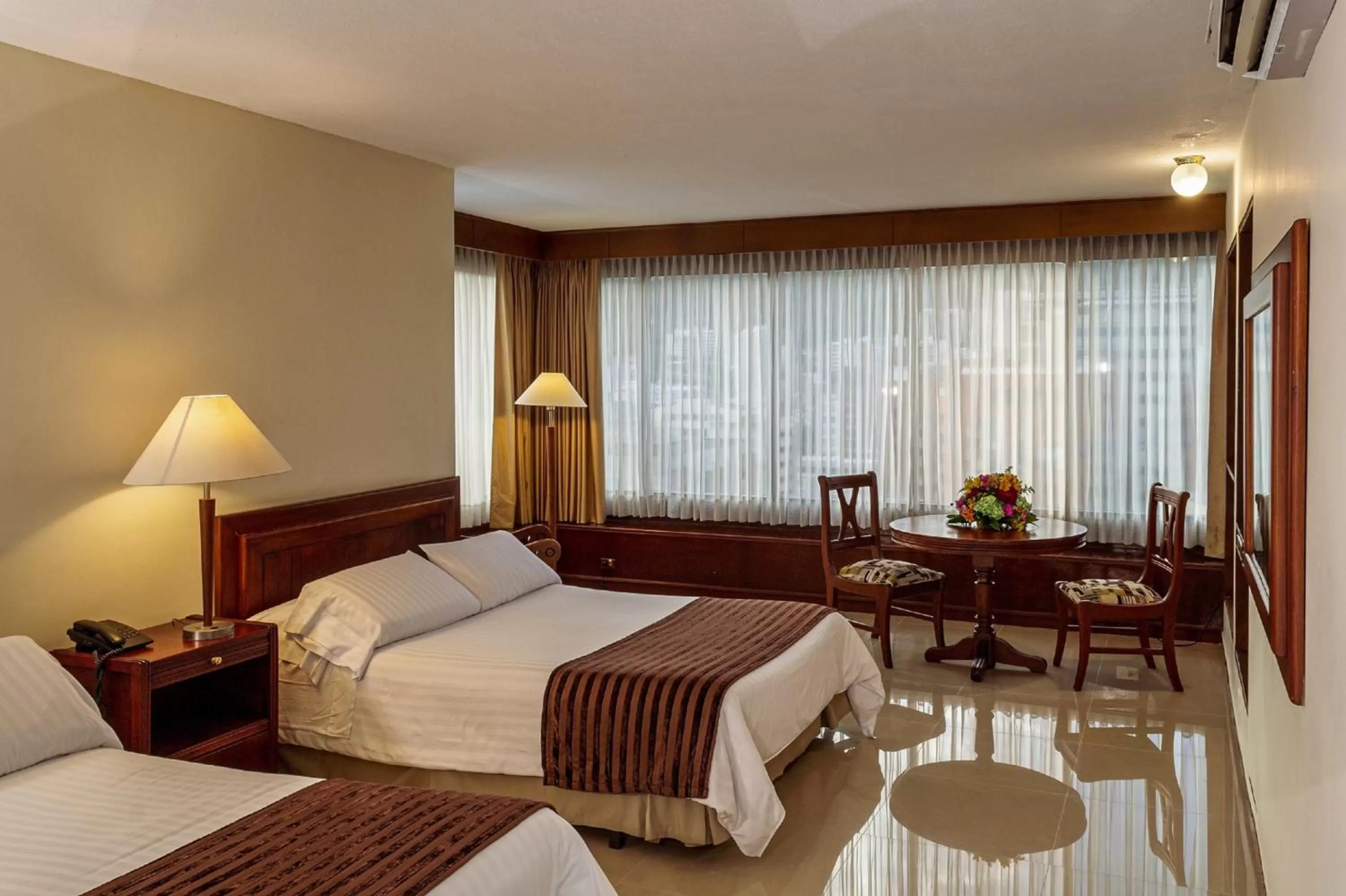 Bed in Torre de Cali Plaza Hotel