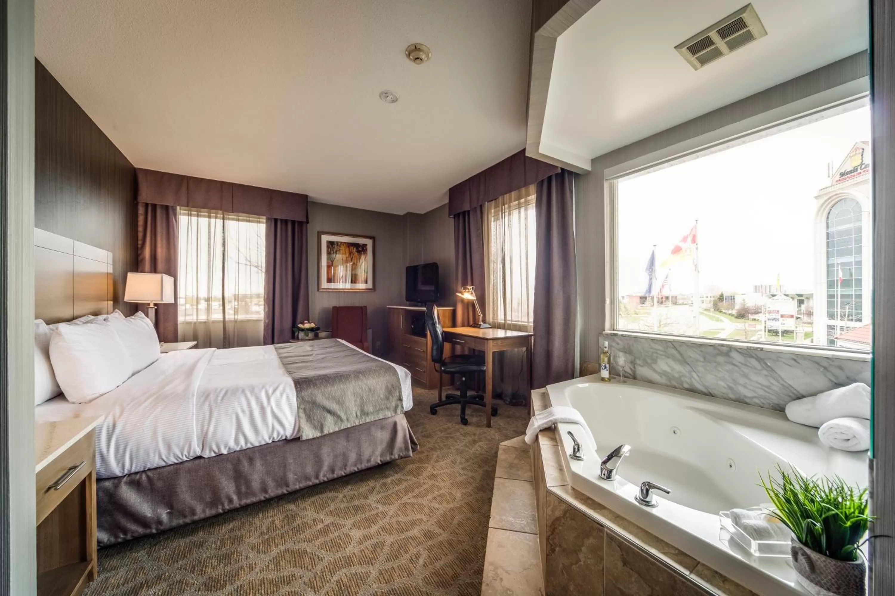 Photo of the whole room, Bed in Monte Carlo Inn Airport Suites