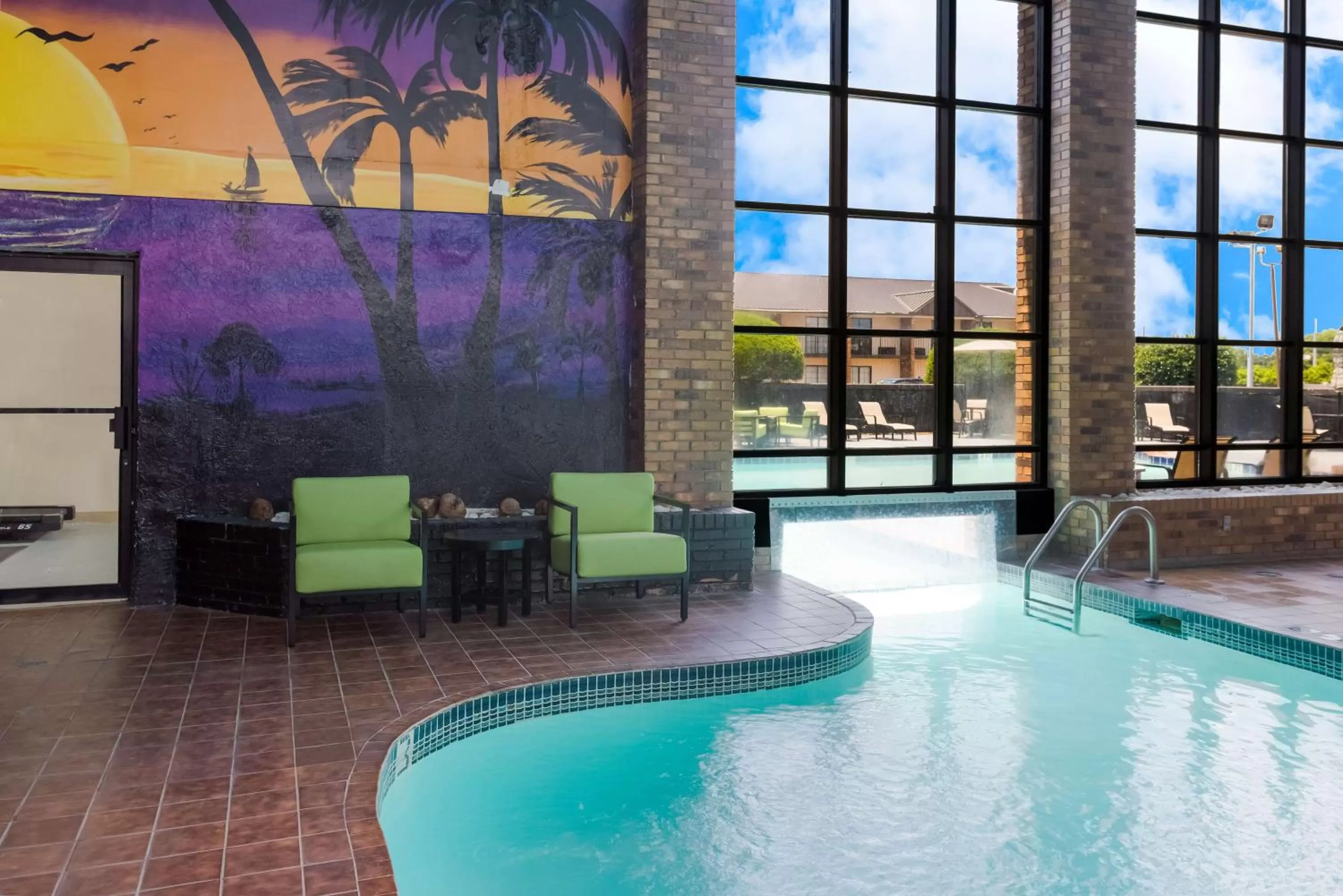 Pool view in SureStay Plus Hotel by Best Western Greenwood