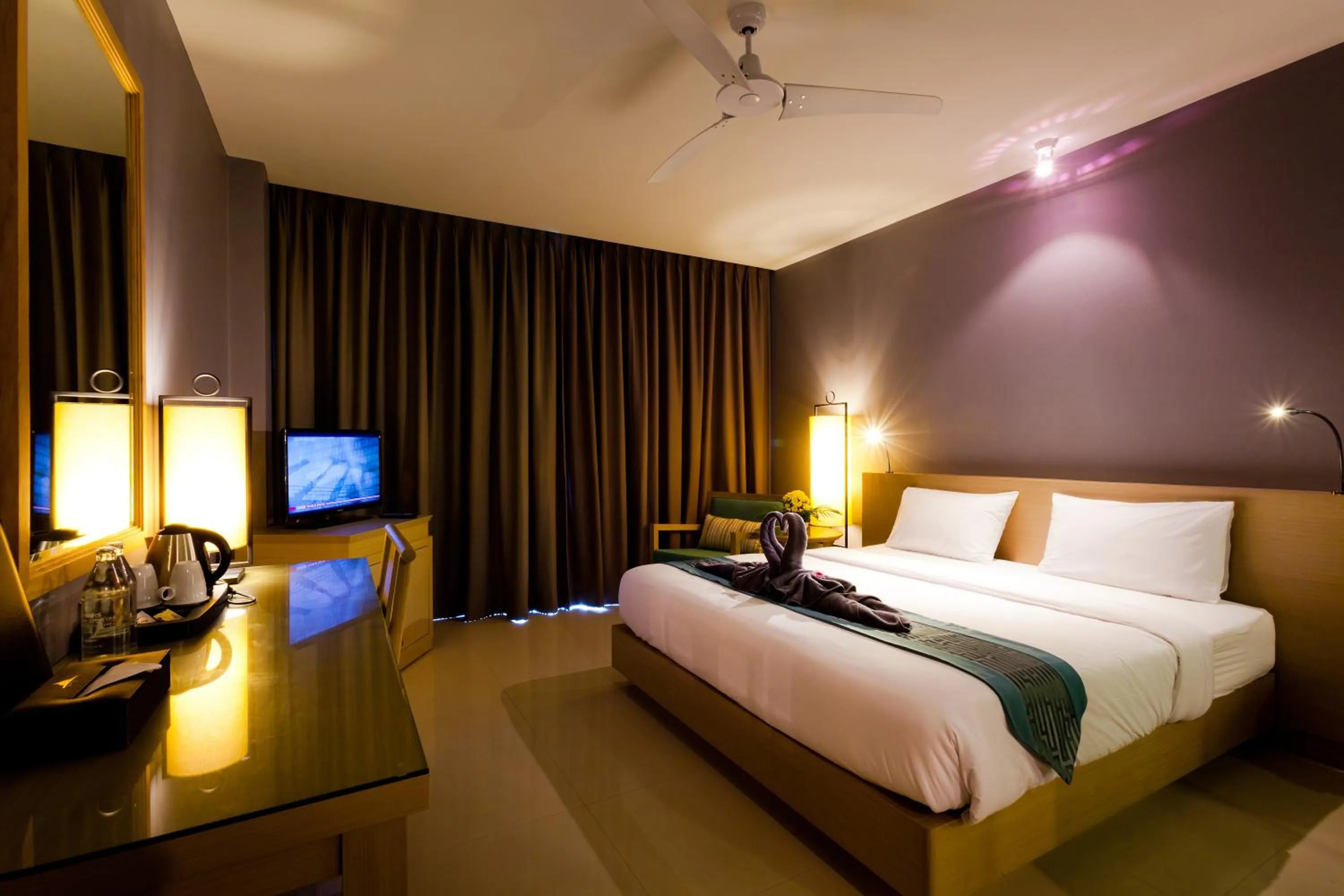 Photo of the whole room, Bed in Ramaburin Resort Patong - SHA Extra Plus