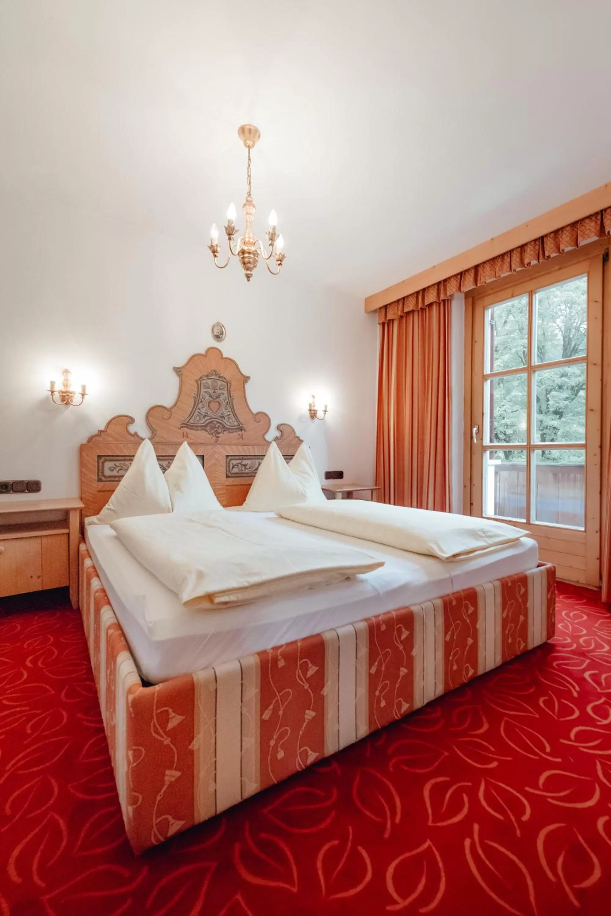 Bed in Zimmer & Ferienwohnungen Dandler