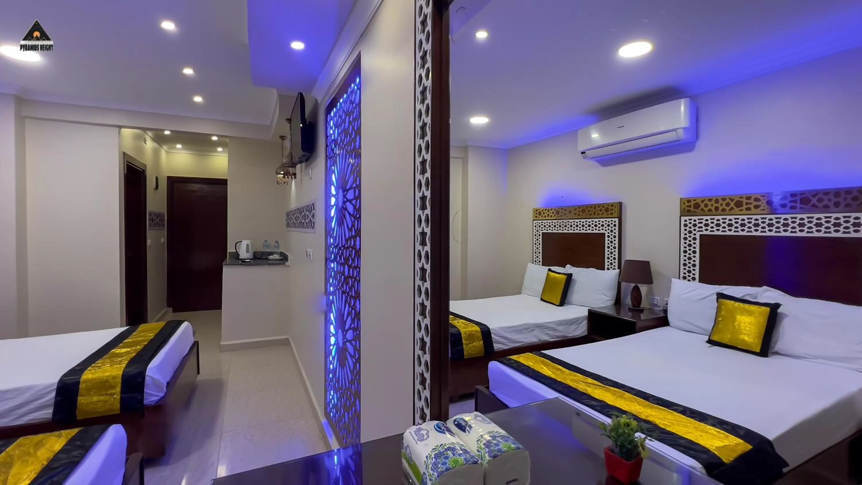 Bed in Pyramids Height Hotel & Pyramids Master Scene Rooftop