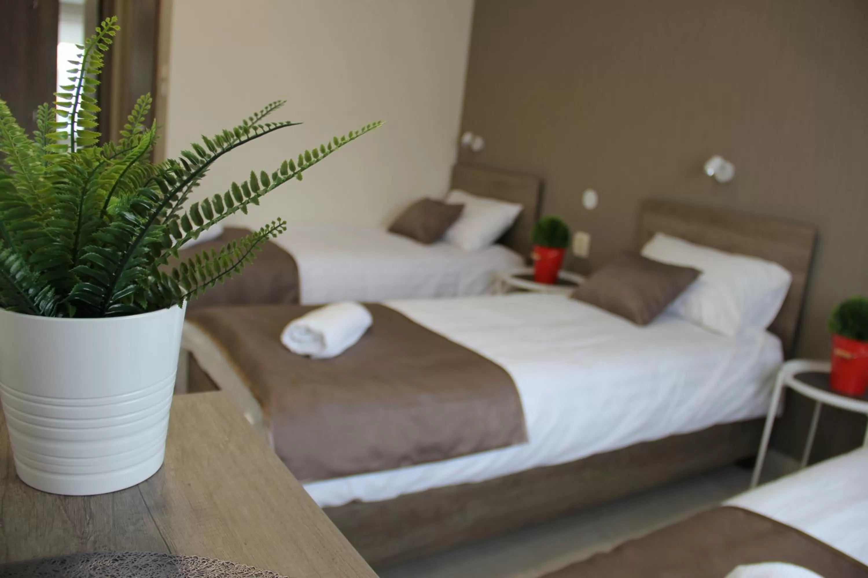 Bed in Familia Panzió & Apartmanház Győr