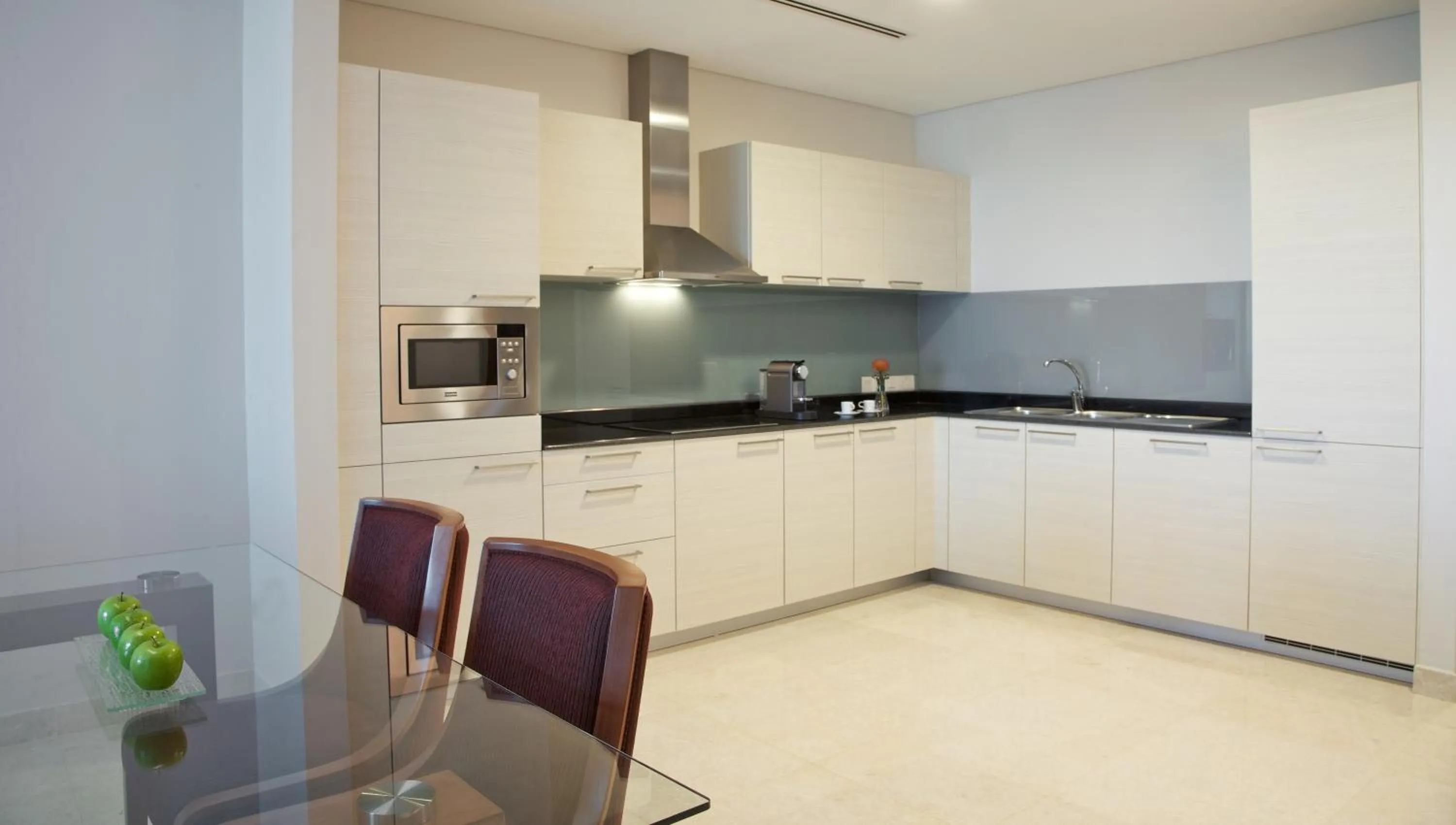 Kitchen or kitchenette in Millennium Executive Apartments Muscat