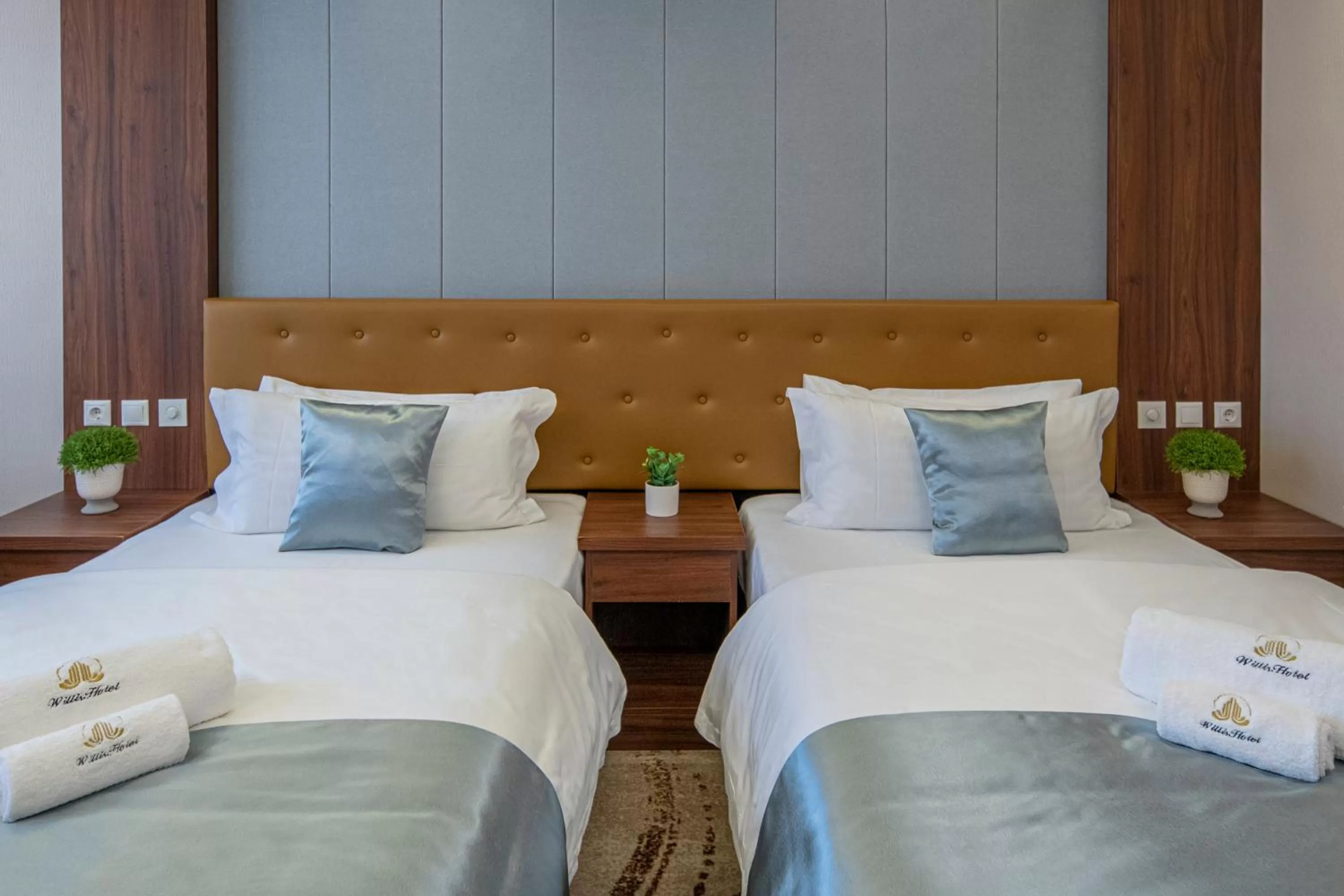 Bed in Willis Hotel Business & Wellness