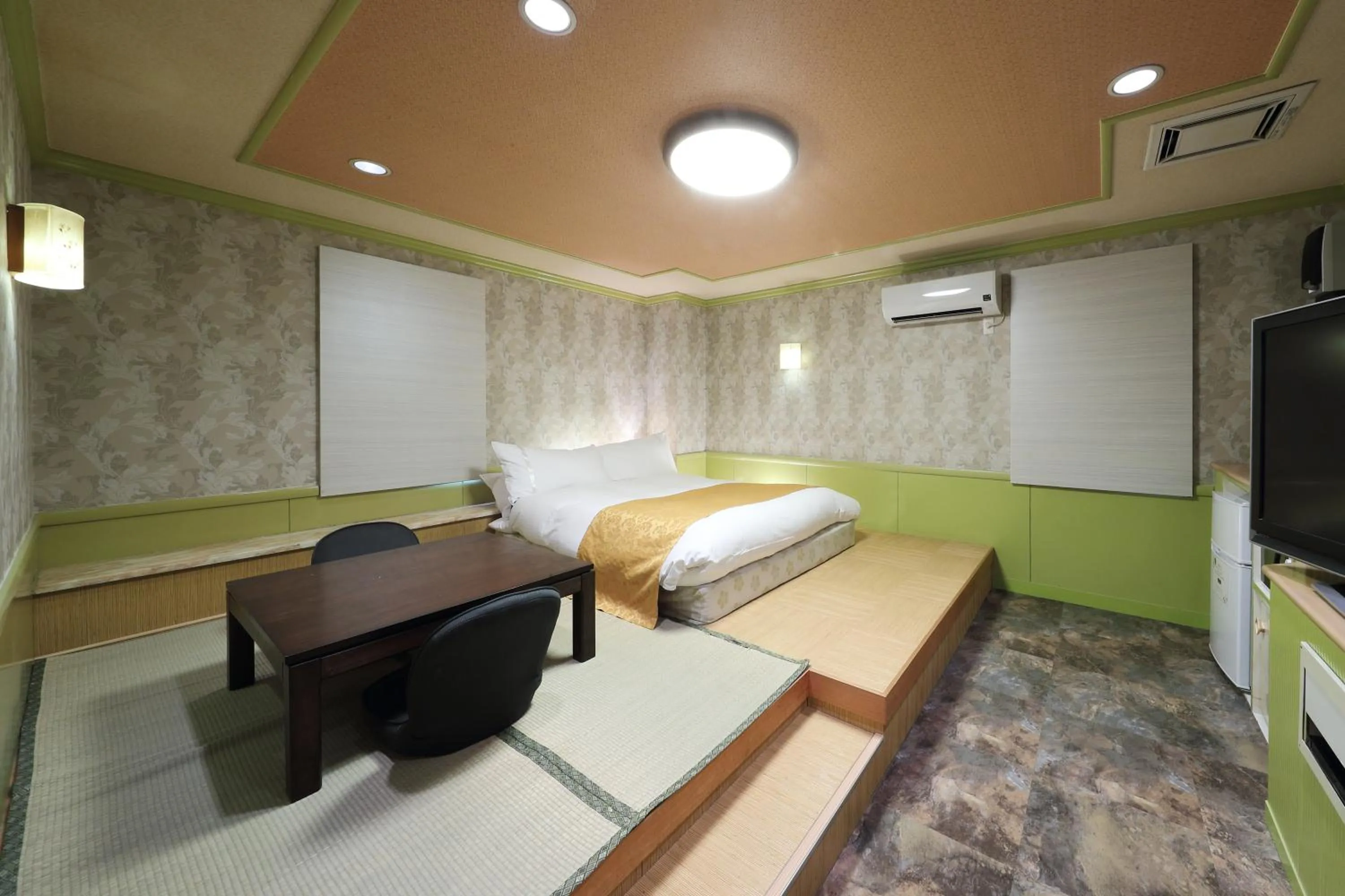 Photo of the whole room, Bed in Hotel Fine Garden Okayama II