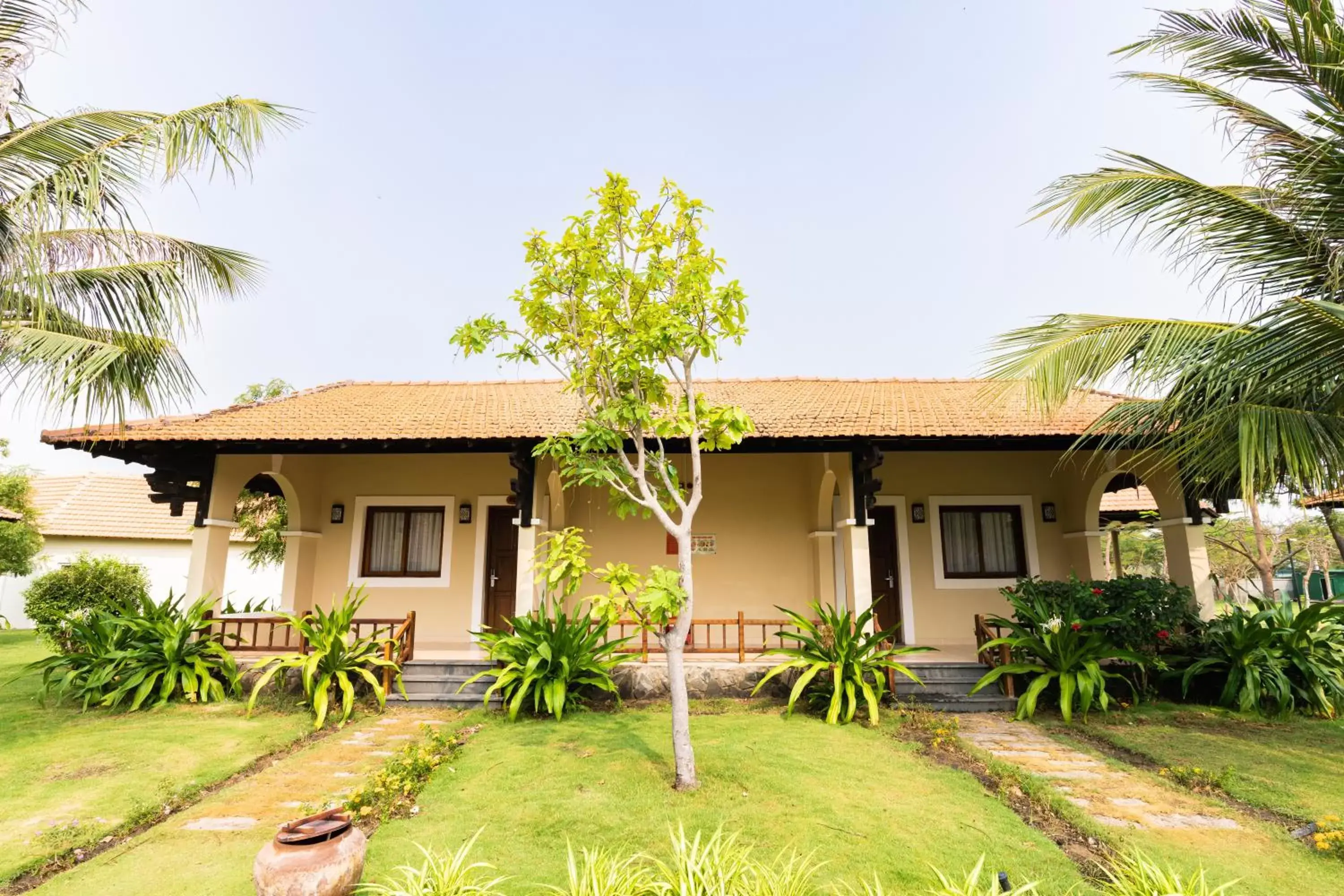 Superior Bungalow Twin Room with Terrace - Garden View in TTC Resort Ninh Thuan - Unlimited Access to Water Park Superior Bungalow Twin Room with Terrace - Garden View in TTC Resort Ninh Thuan - Unlimited Access to Water Park