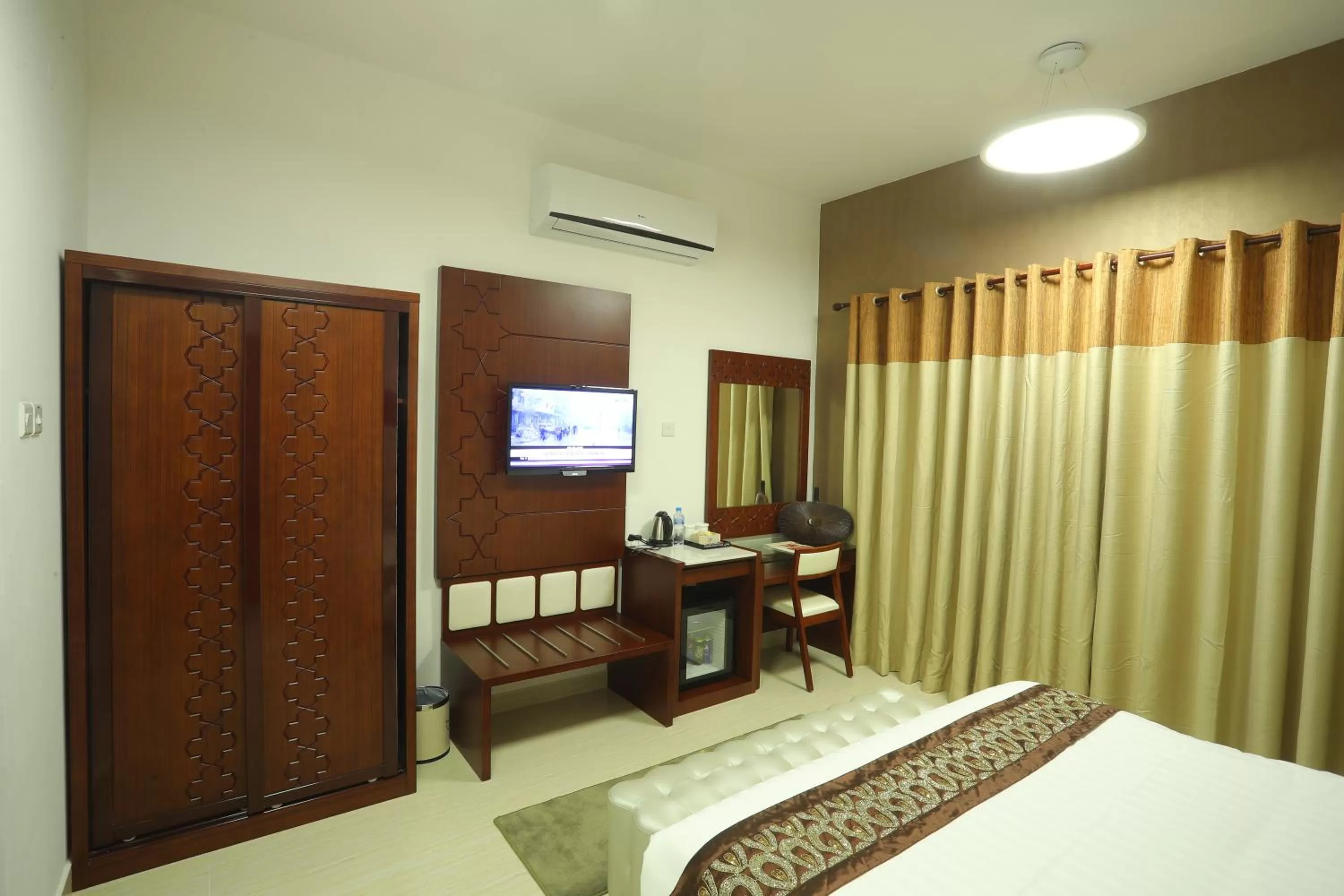 Bedroom in Zaki Hotel Apartment