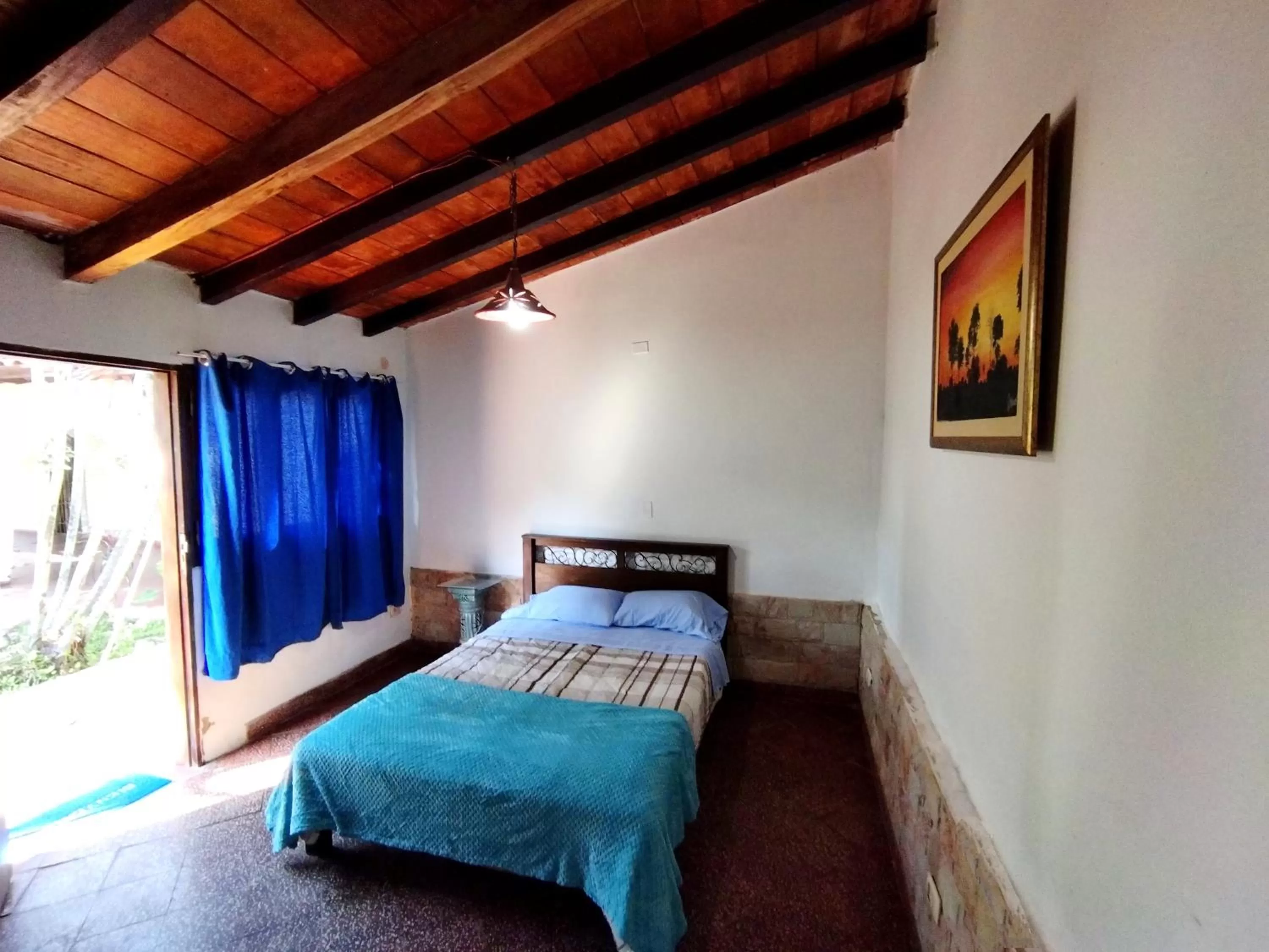 Bed in Hotel La Aparesida