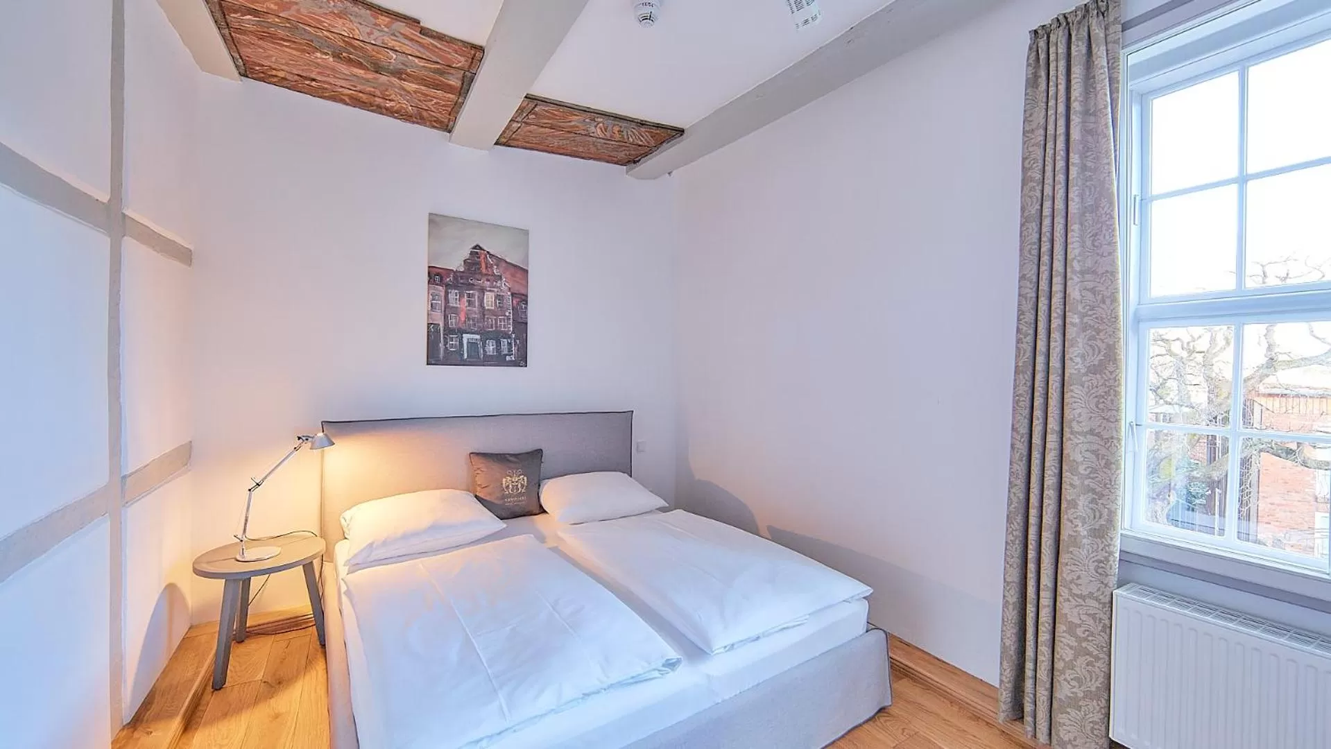 Photo of the whole room, Bed in Anno 1433 Hotel Lüneburg