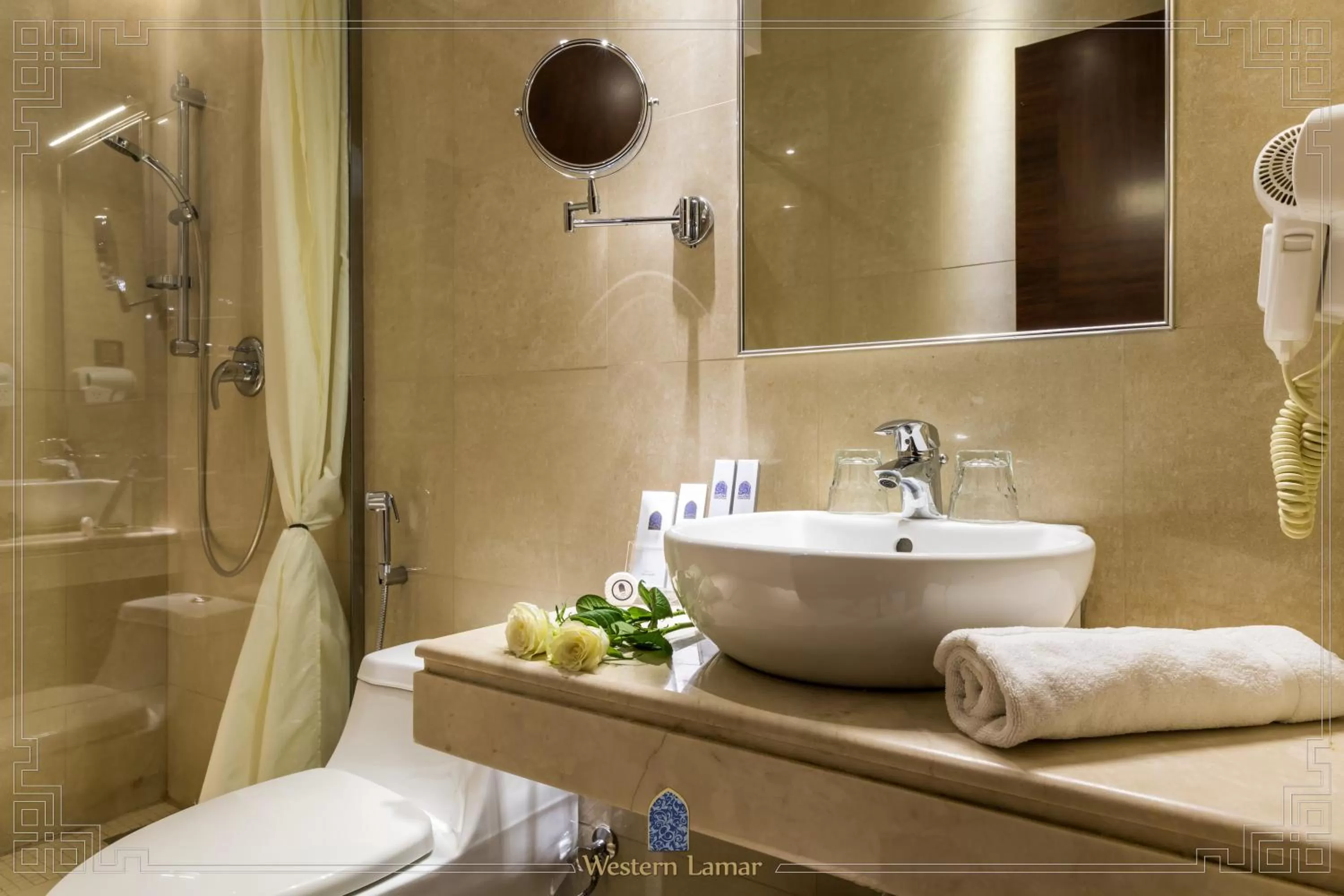 Bathroom in Western Lamar Hotel