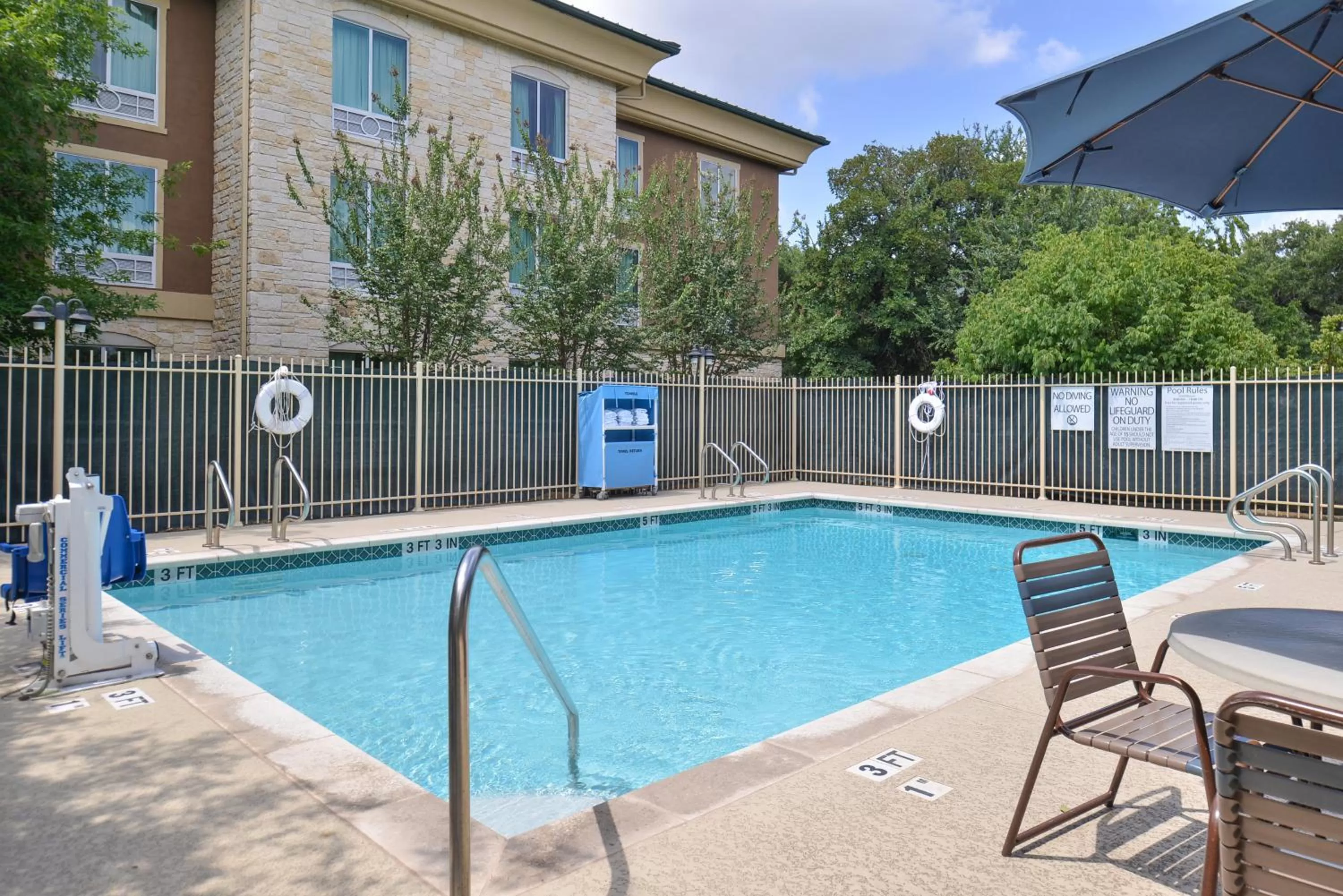 Swimming pool in Holiday Inn Express & Suites Austin SW - Sunset Valley by IHG Hotel