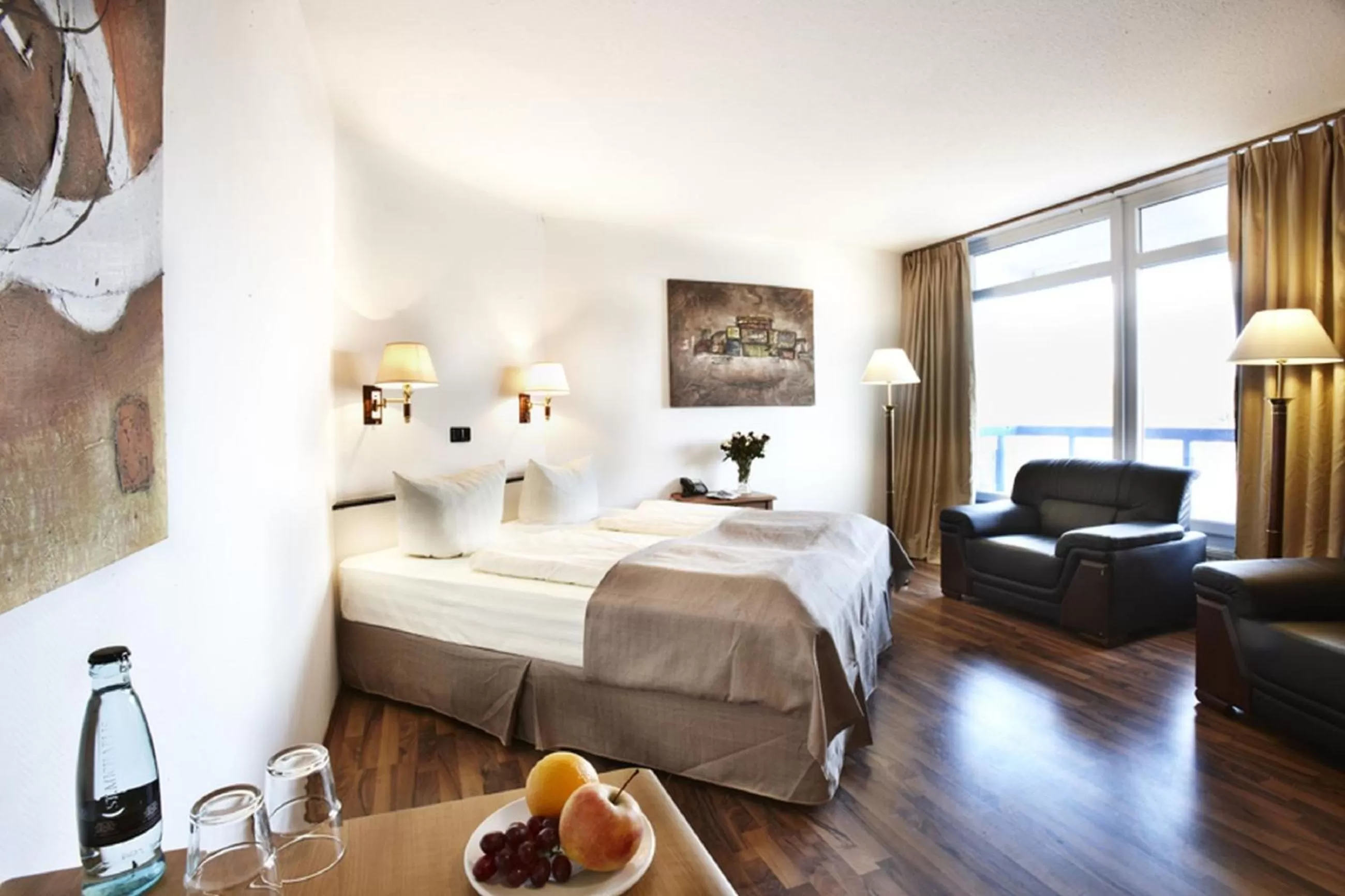 Photo of the whole room, Bed in Hotel Plöner See by Tulip Inn