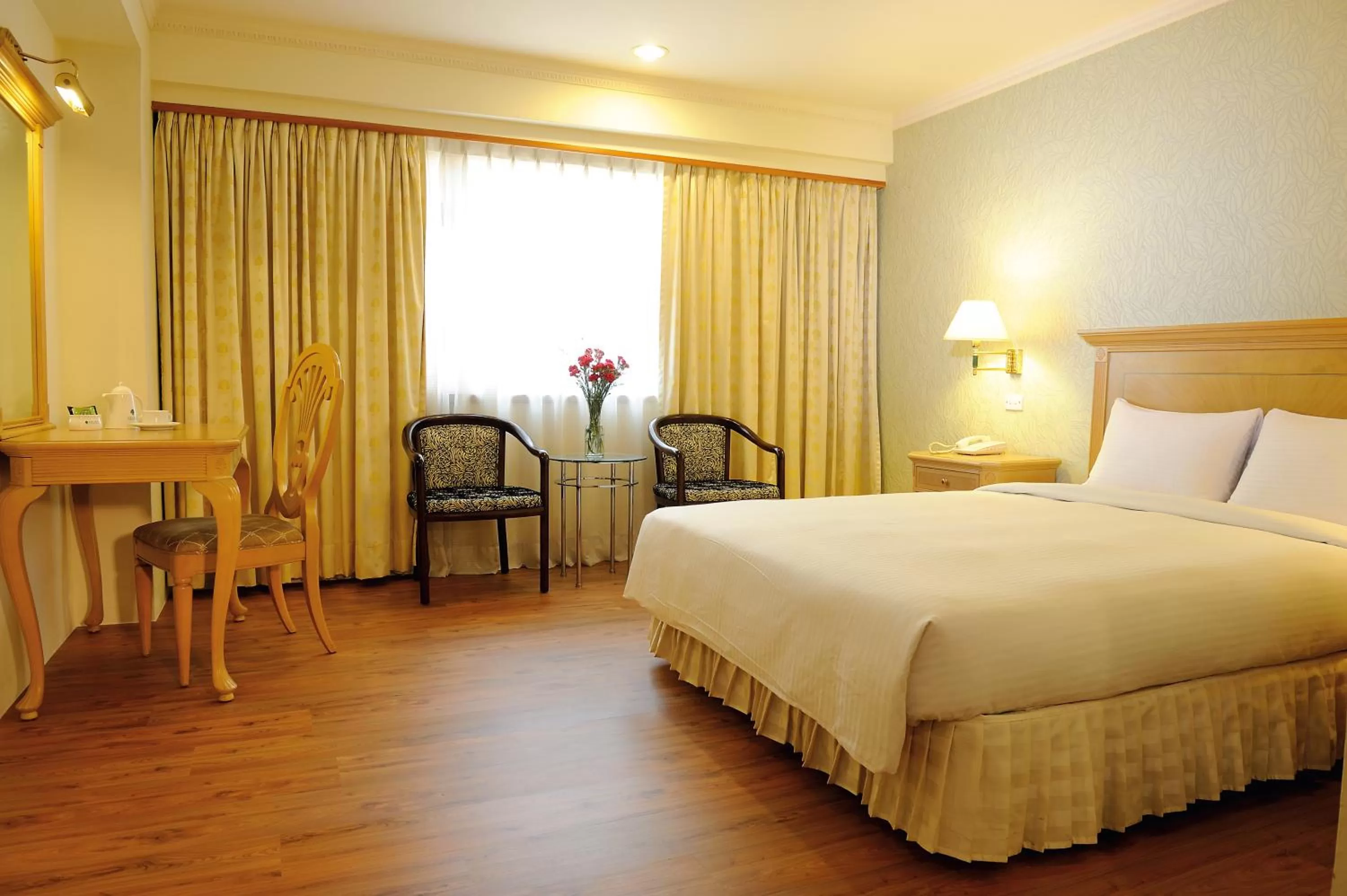 Photo of the whole room, Bed in Cambridge Tainan Hotel