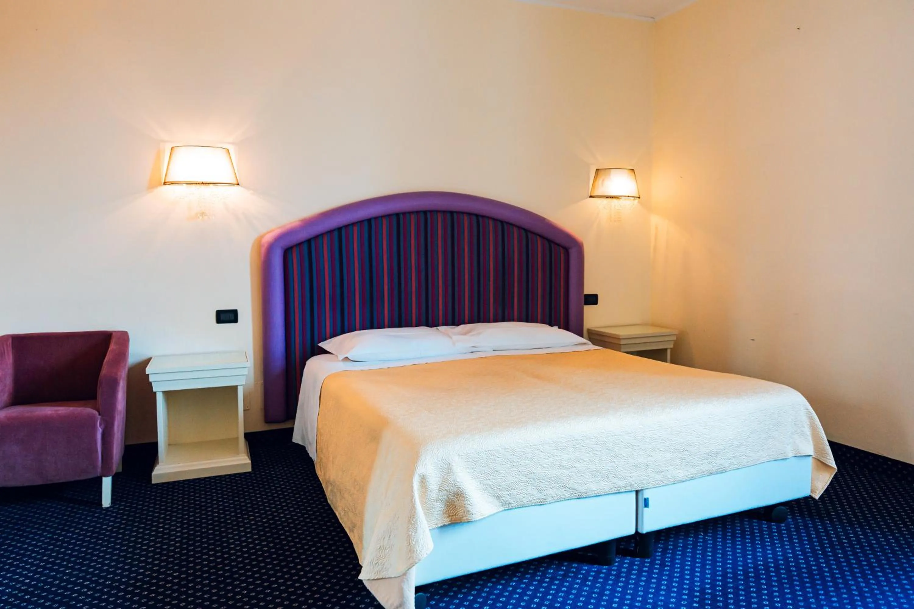 Bed in Panoramic Rooms Torre della Vittoria