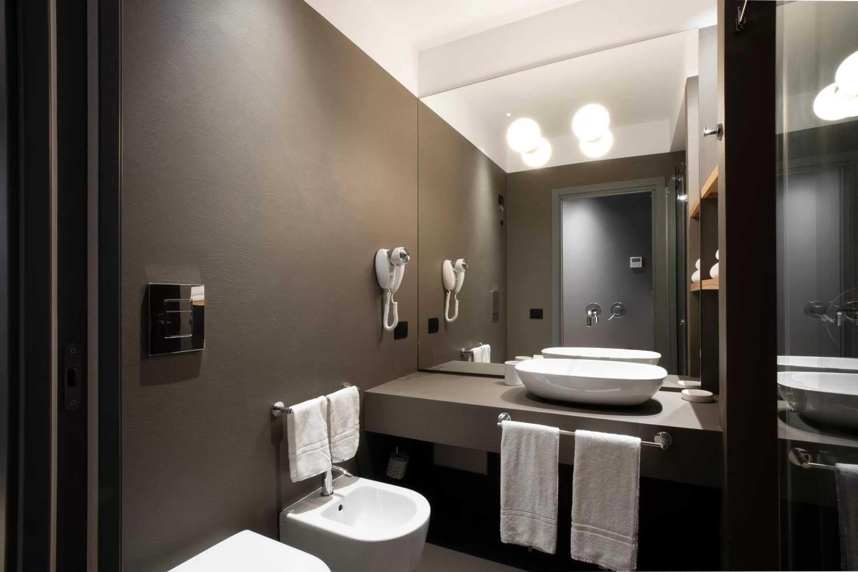 Toilet in Re Sale Boutique Hotel