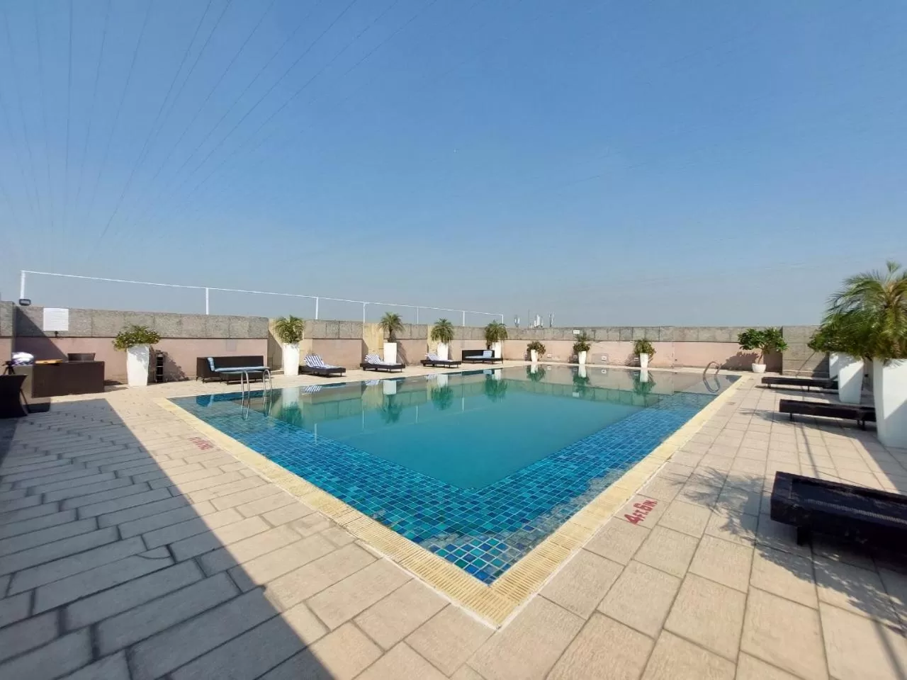 Swimming pool in Svelte Delhi, a member of Radisson Individuals