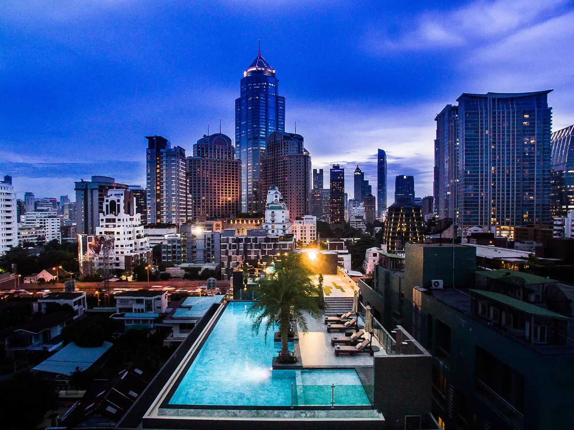 Swimming pool in SureStay Plus by Best Western Sukhumvit 2