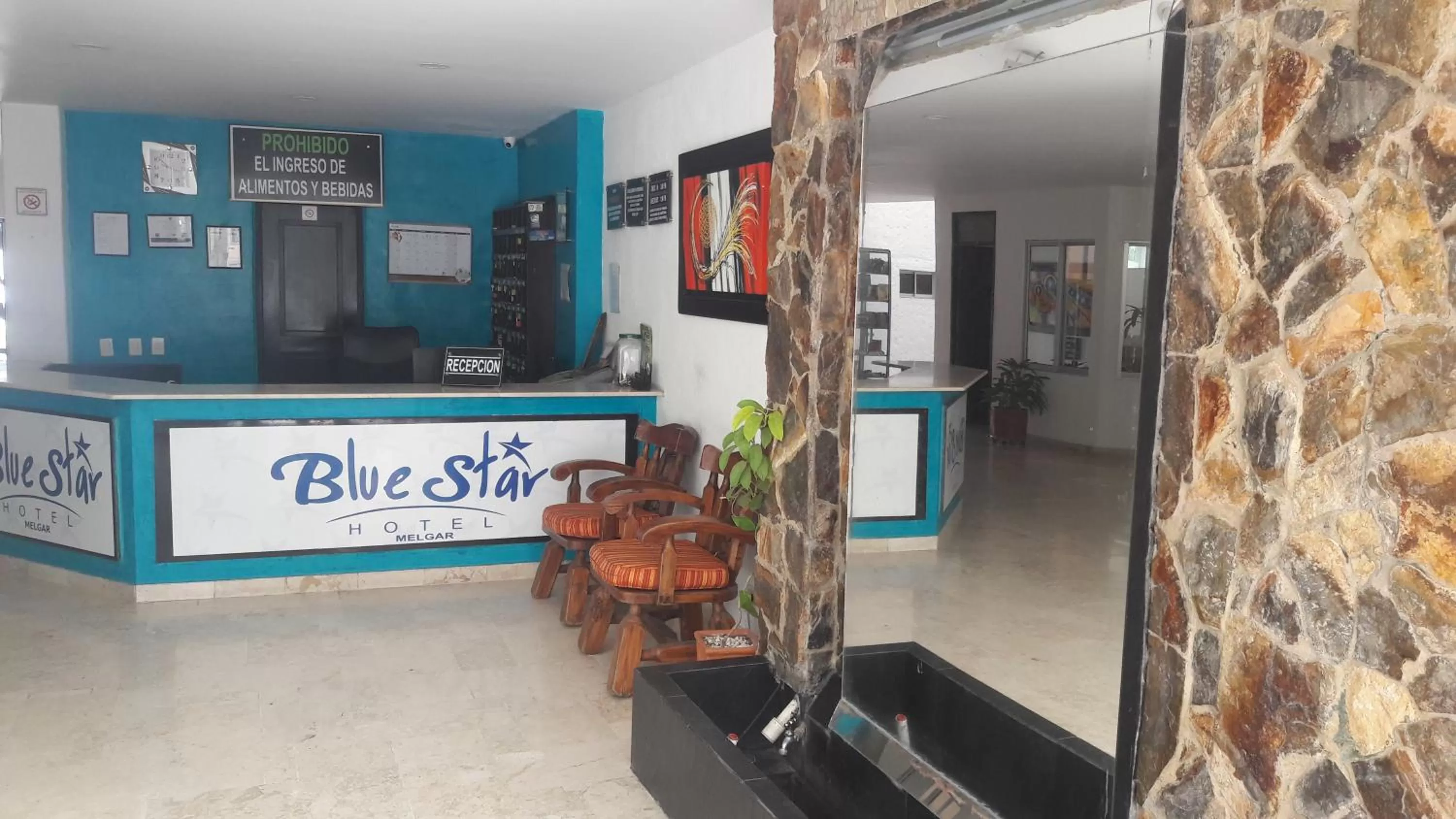 Communal lounge/ TV room in Blue Star Hotel