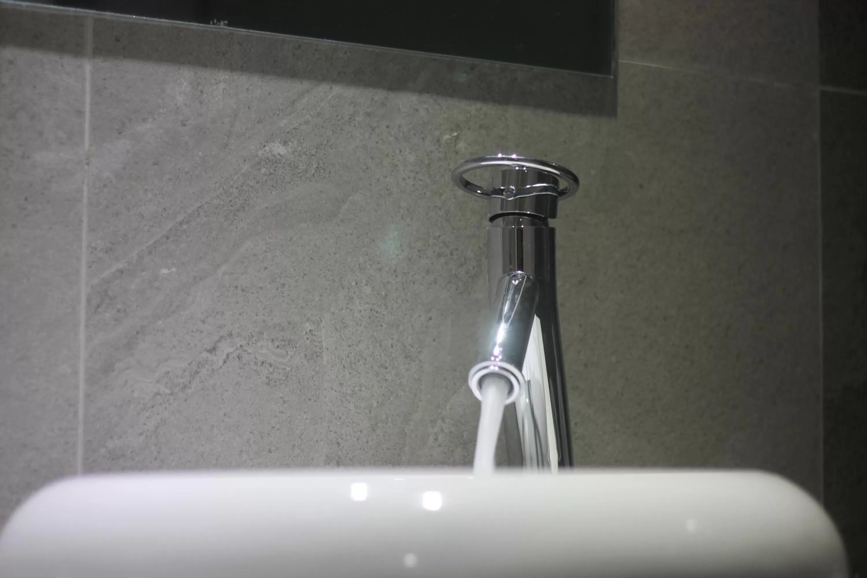 Bathroom in Benny's City Hotel