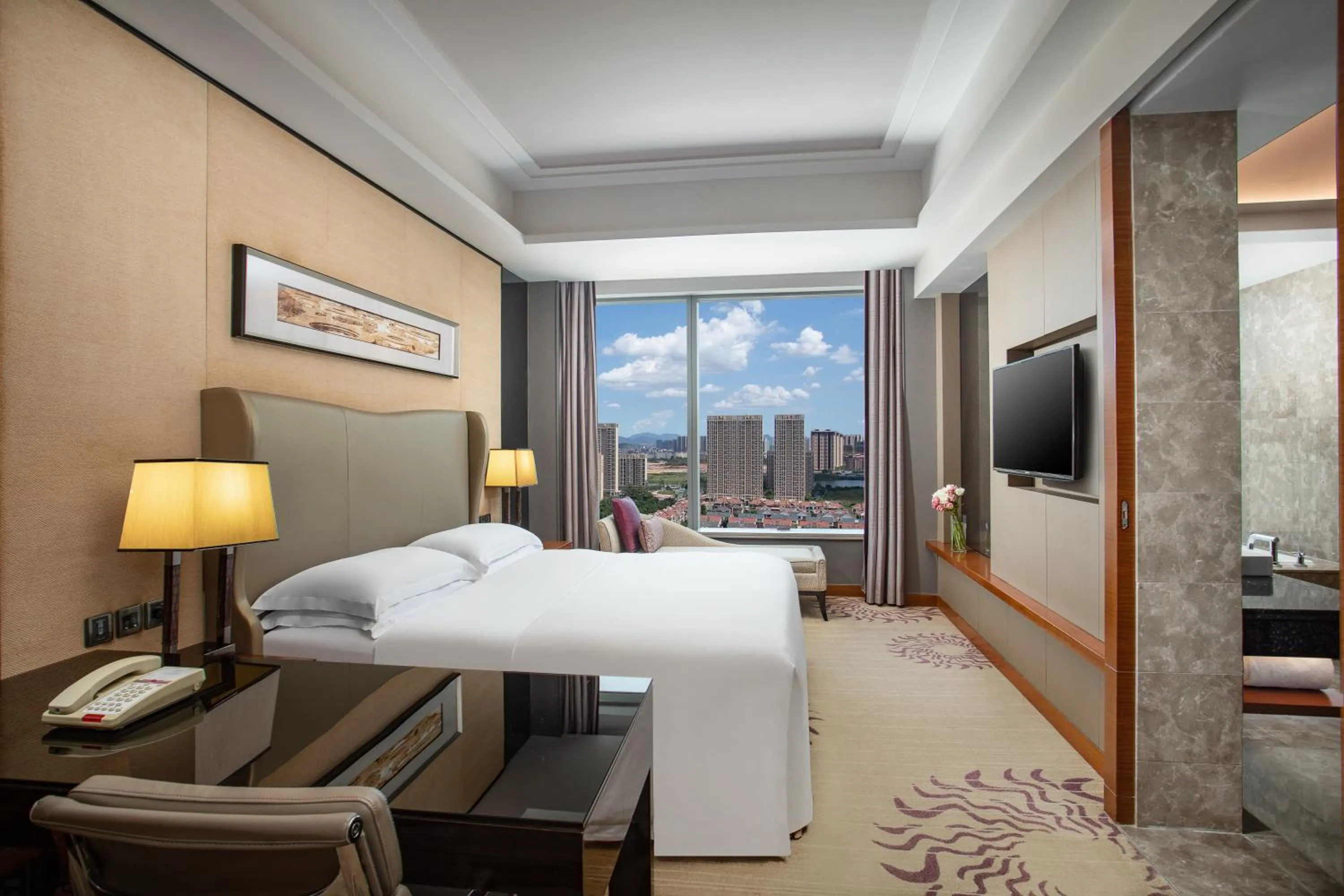 Bed in Crowne Plaza Huizhou by IHG