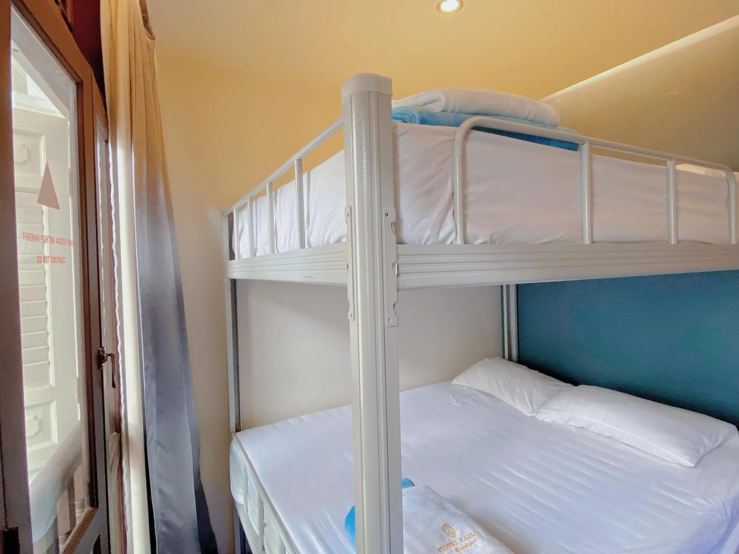 Deluxe Quadruple Room in Hotel Calmo Chinatown