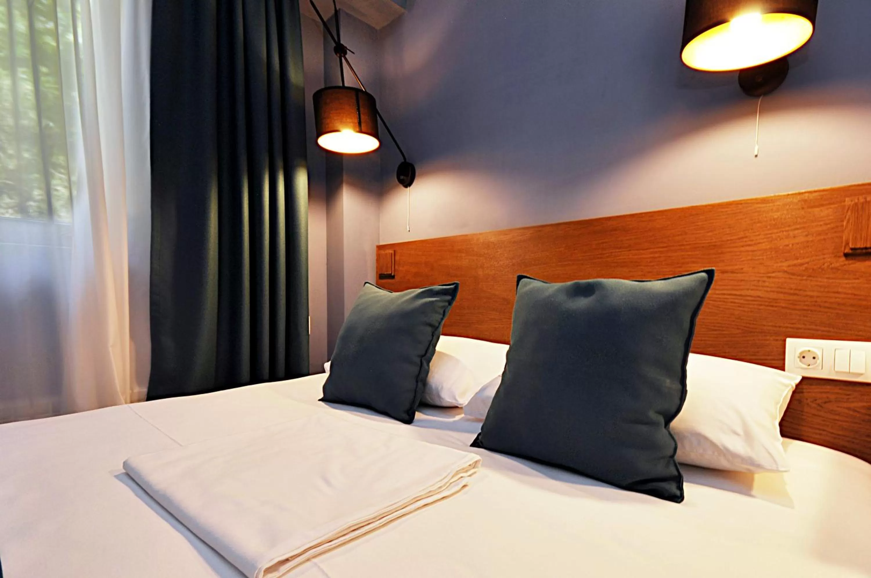 Bed in Elle Boutique Hotel