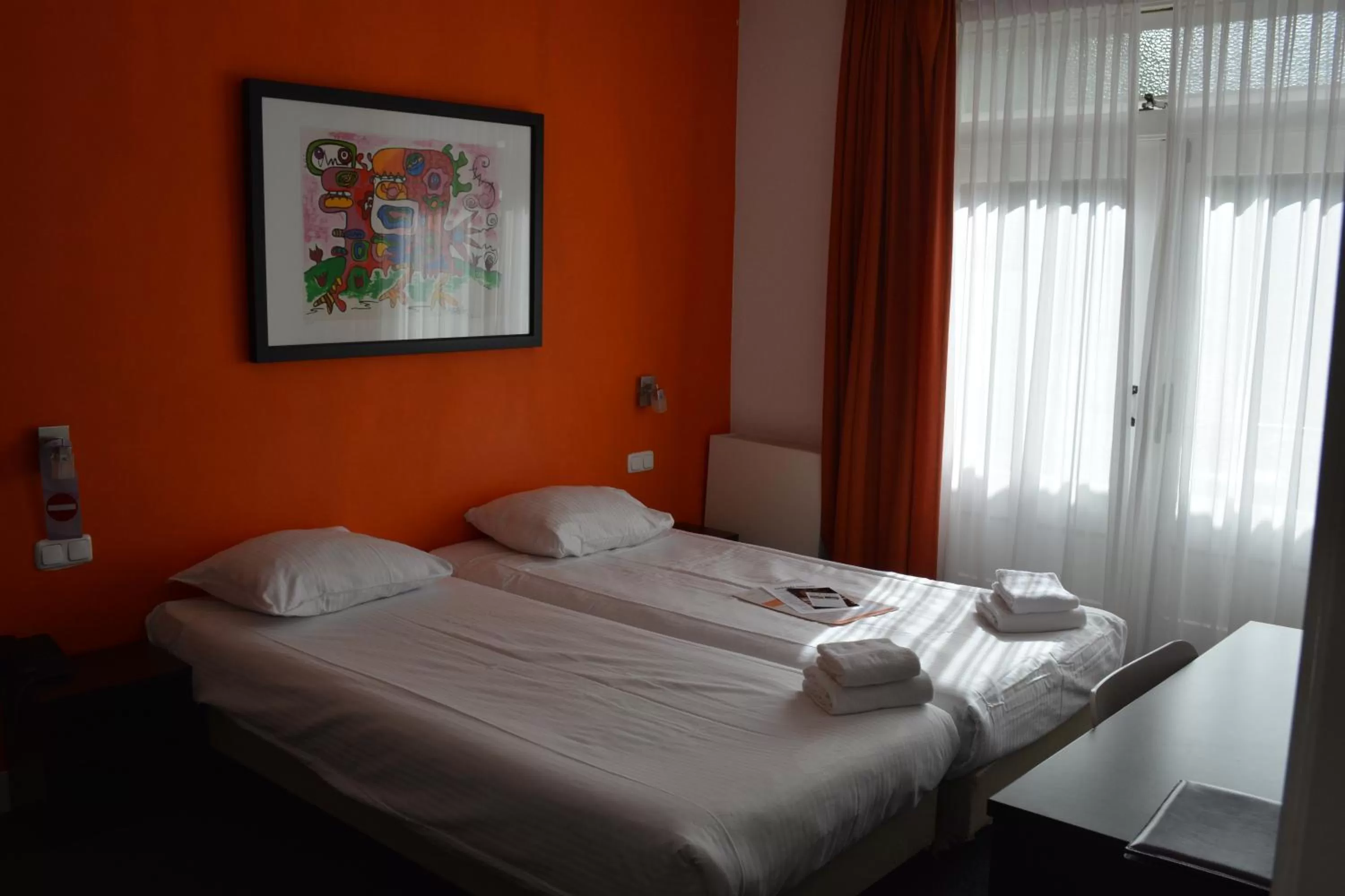 Bed in Hotel Oranjeoord