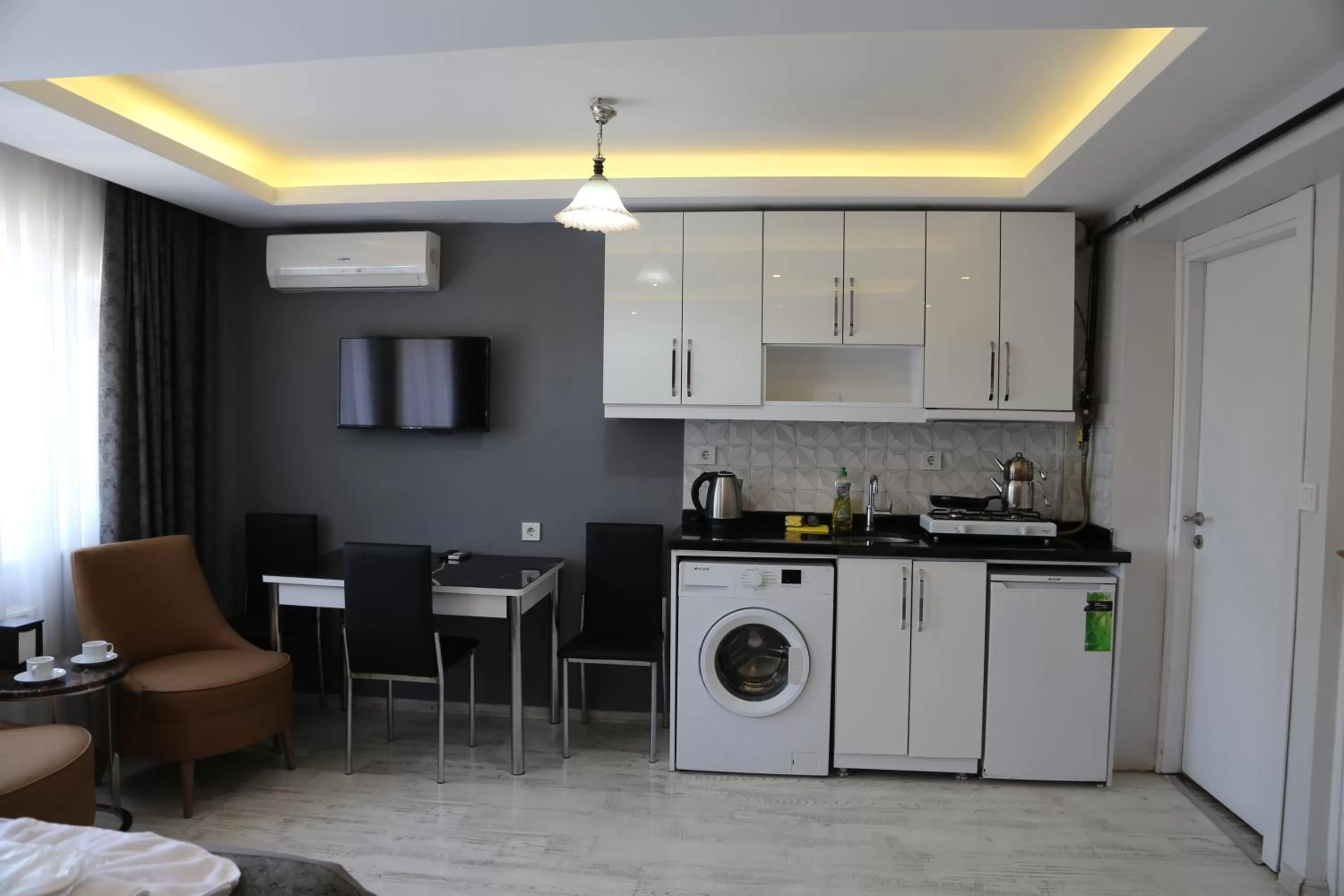 Kitchen or kitchenette in Arat Apartments
