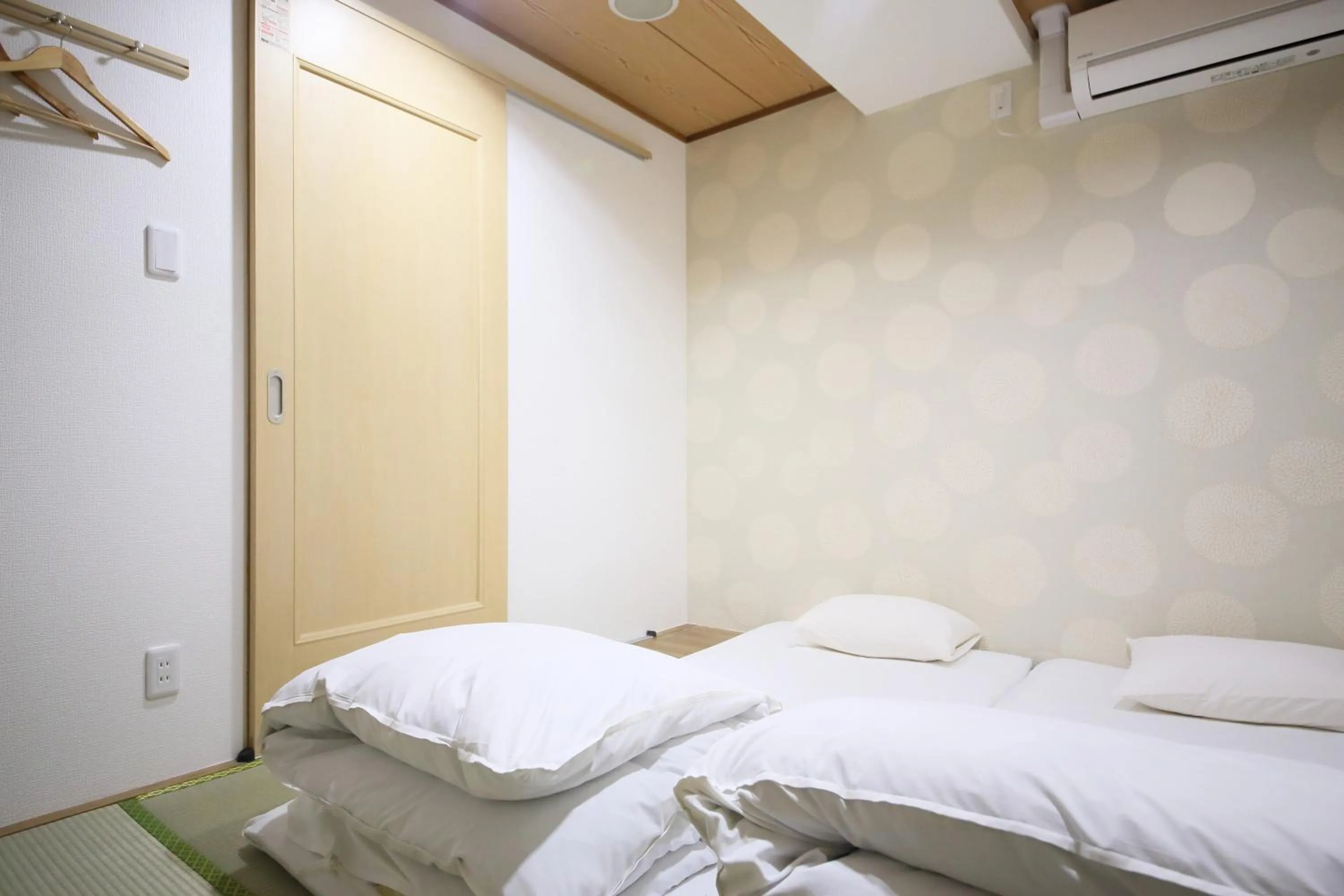 Bed in Hotel Shin-Imamiya