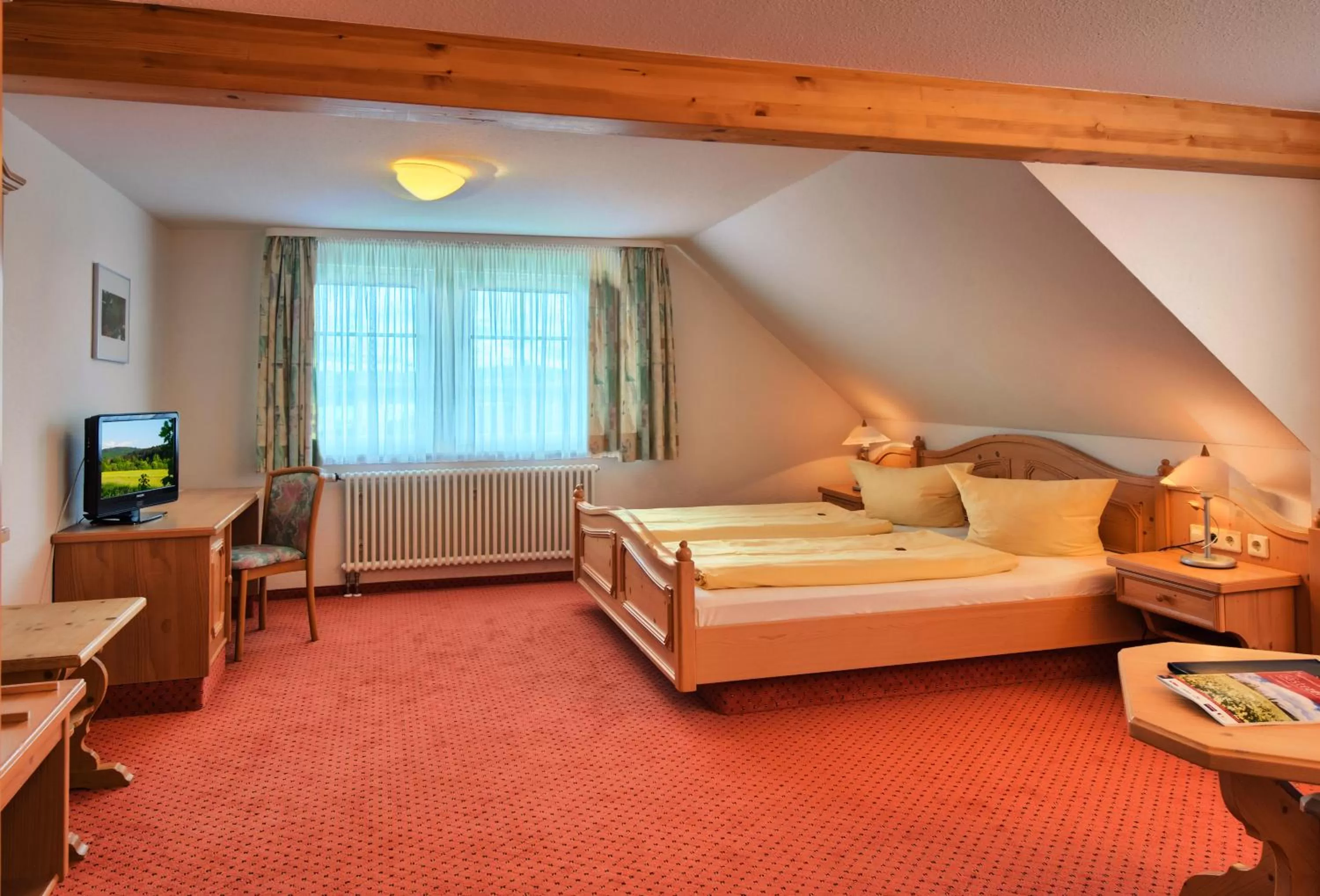 Photo of the whole room, Bed in JUFA Hotel Schwarzwald