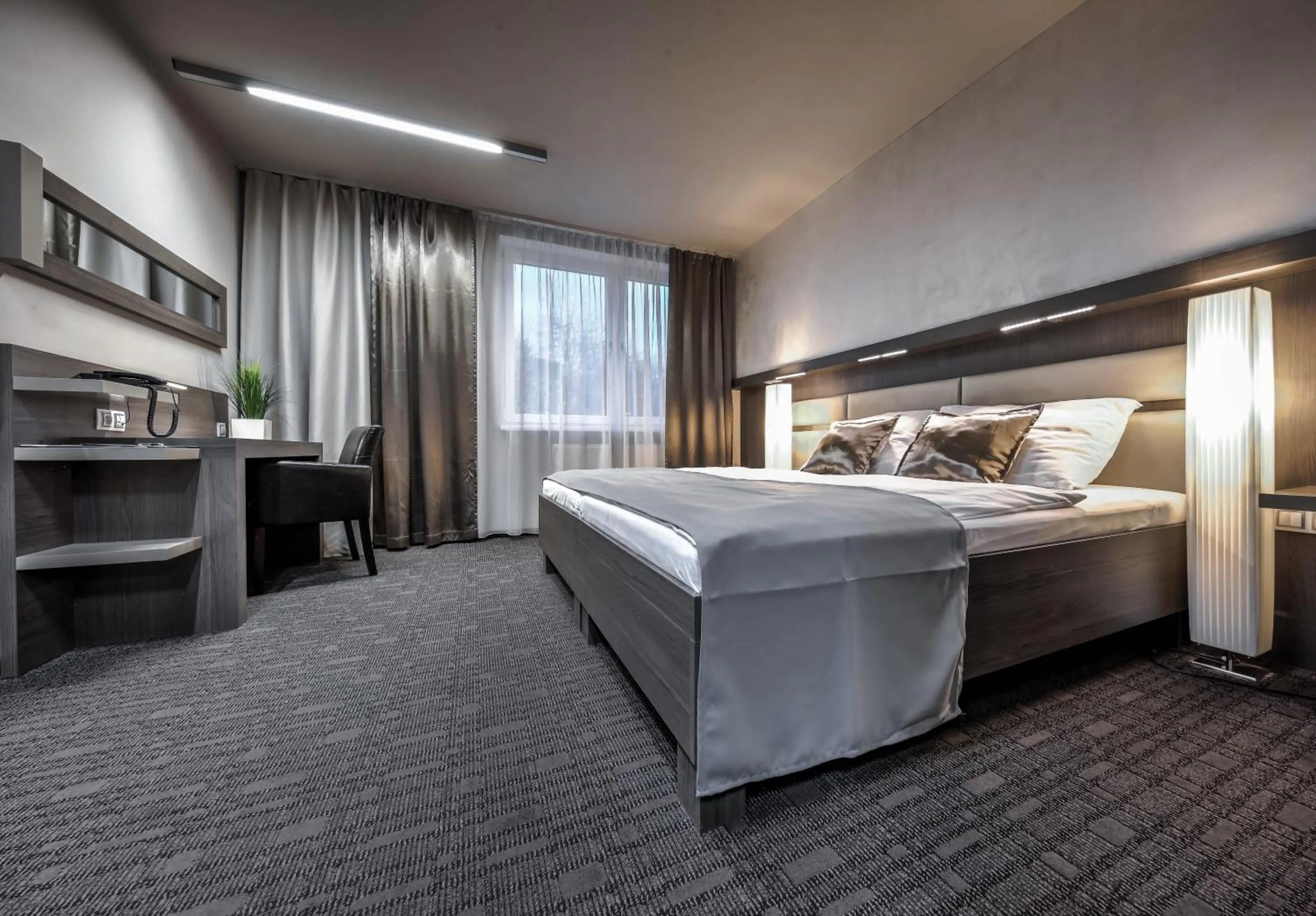 Bed in Volcano Spa Hotel