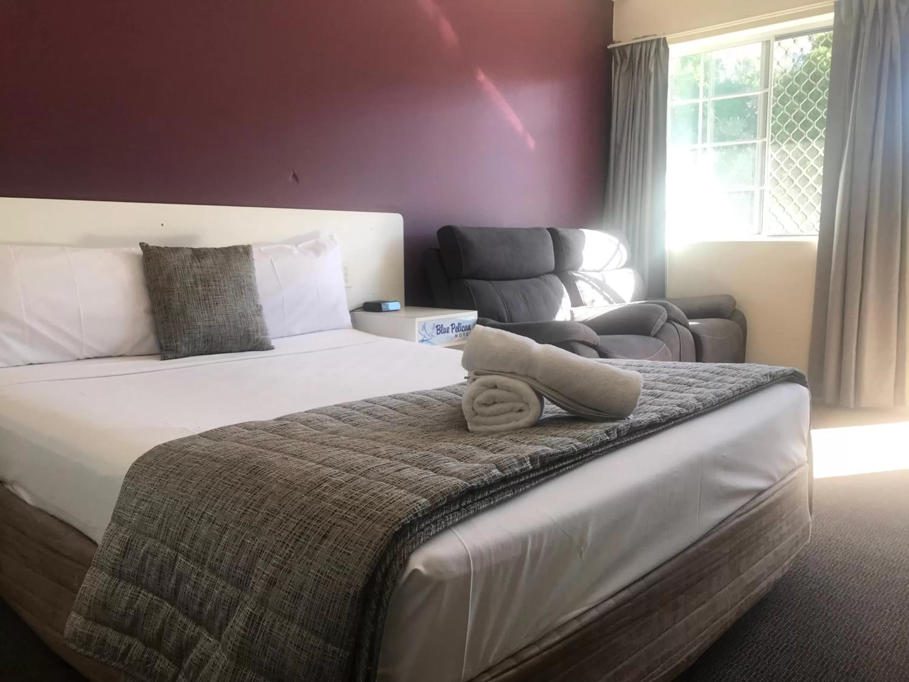 Bed in Blue Pelican Motel