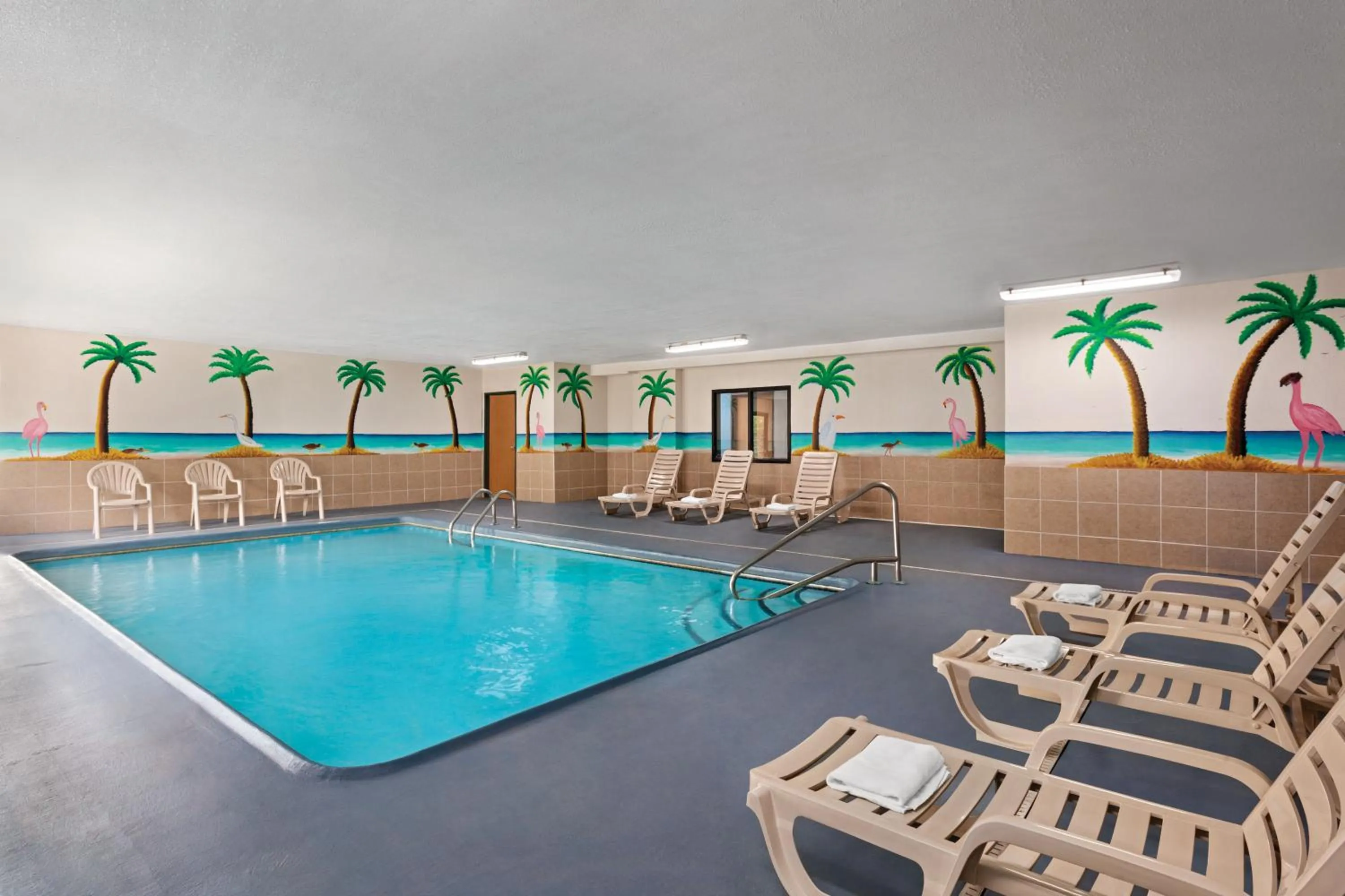 Swimming pool in Days Inn by Wyndham Kansas City International Airport