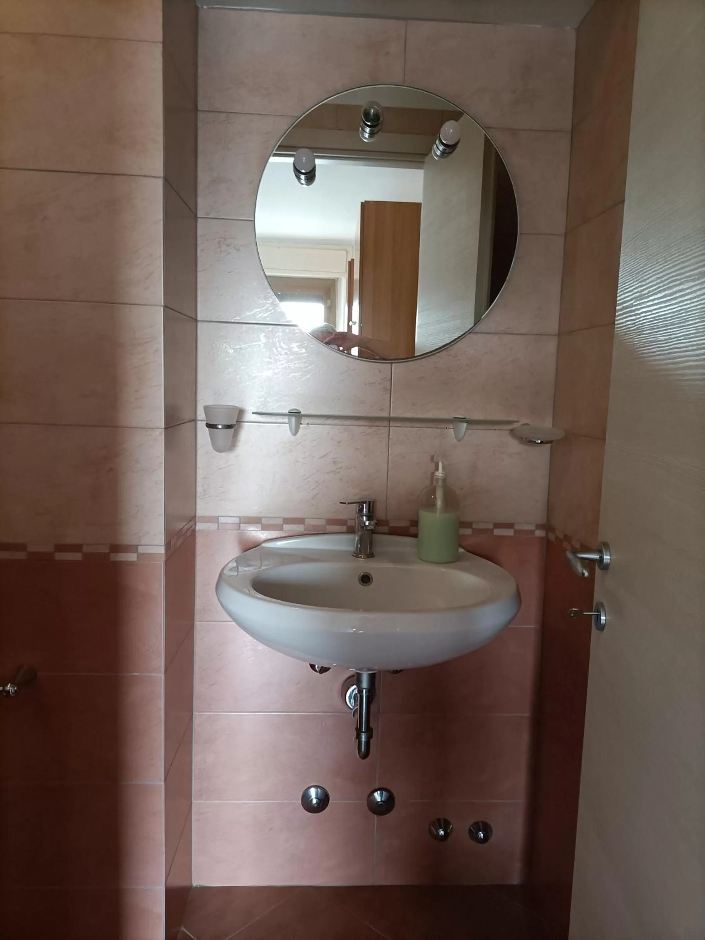 Bathroom in Albergo Roma