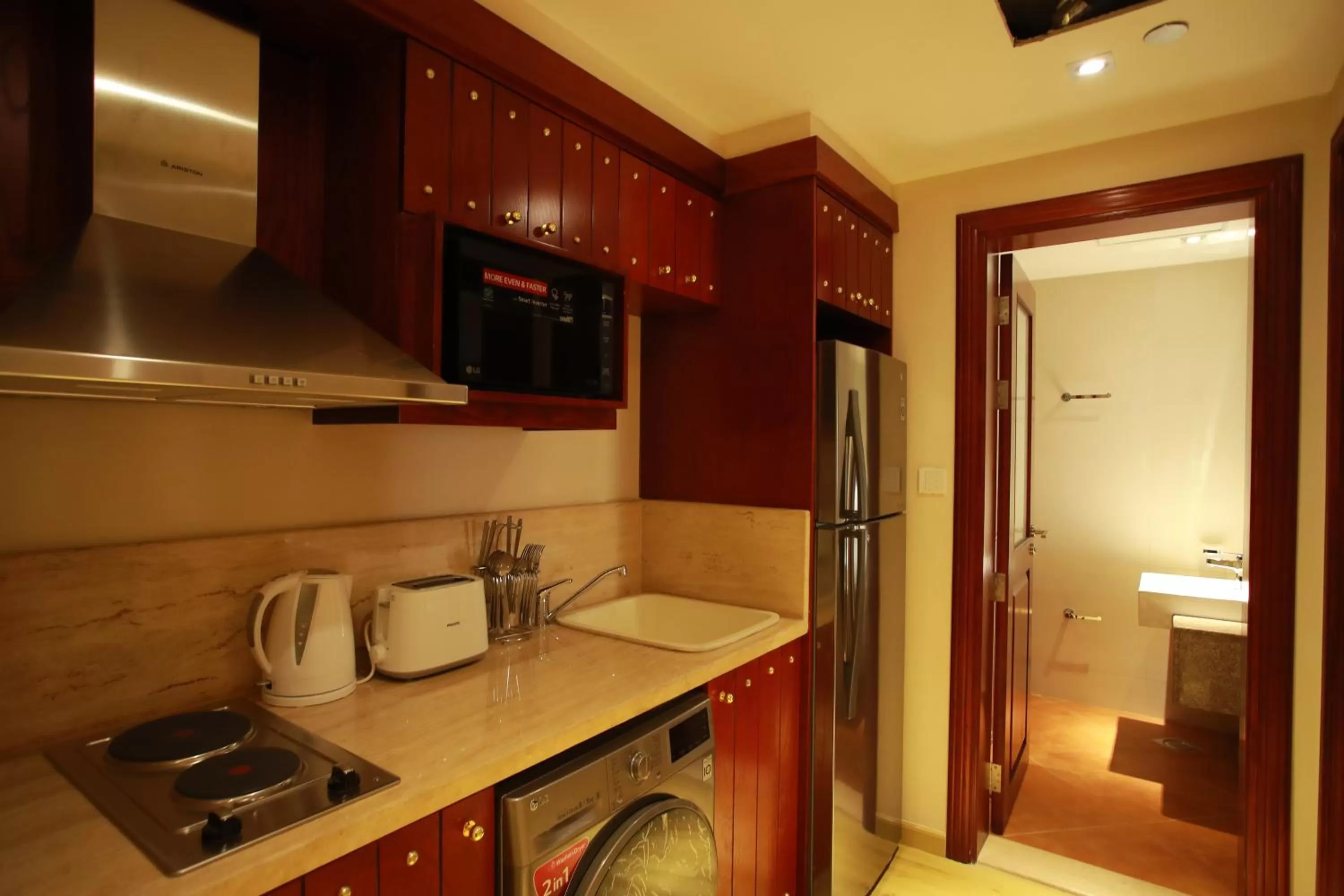 Kitchen or kitchenette in Al Liwan Suites Rawdat Al Khail