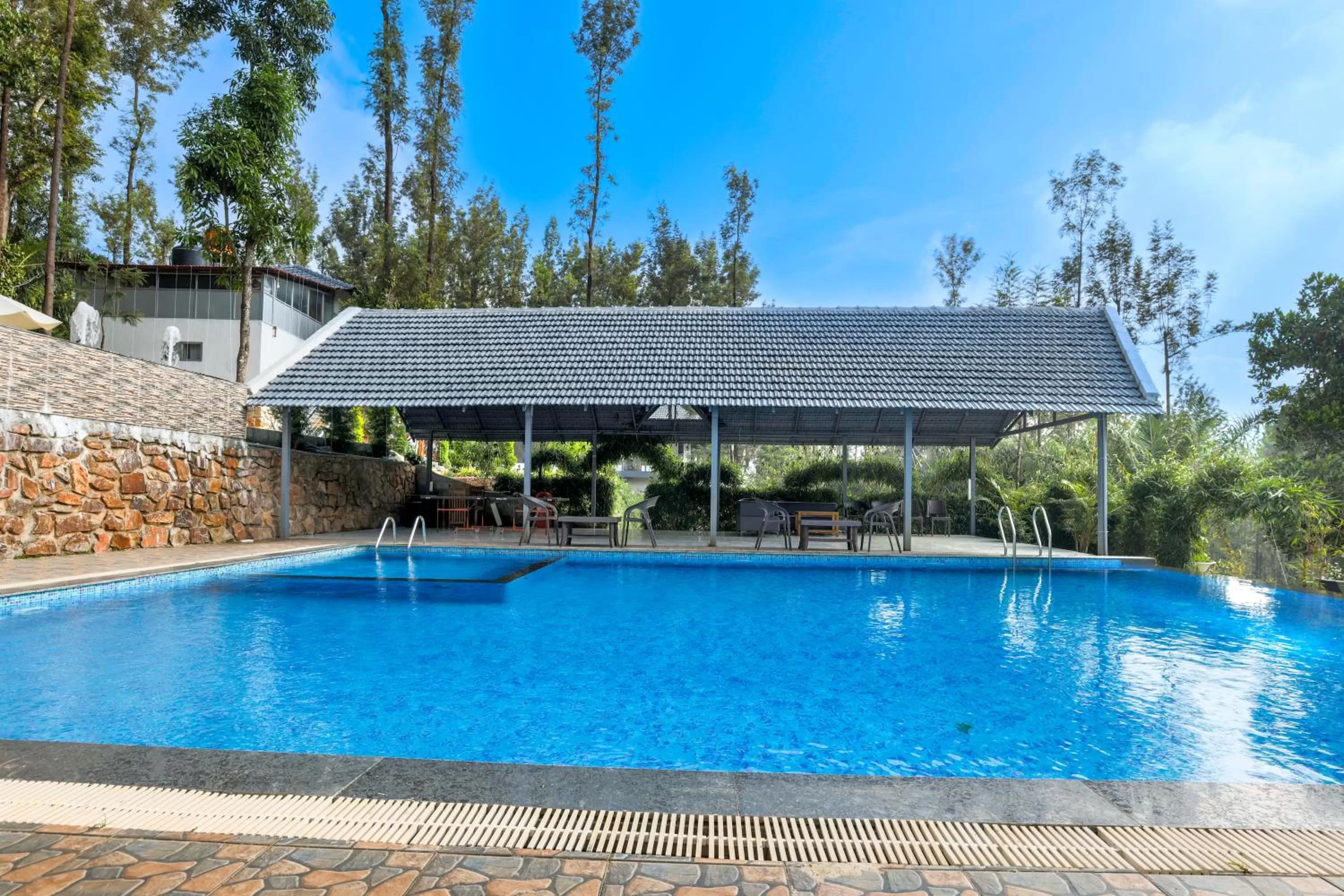 Swimming pool in The Spectrum Resort - Chikmagalur