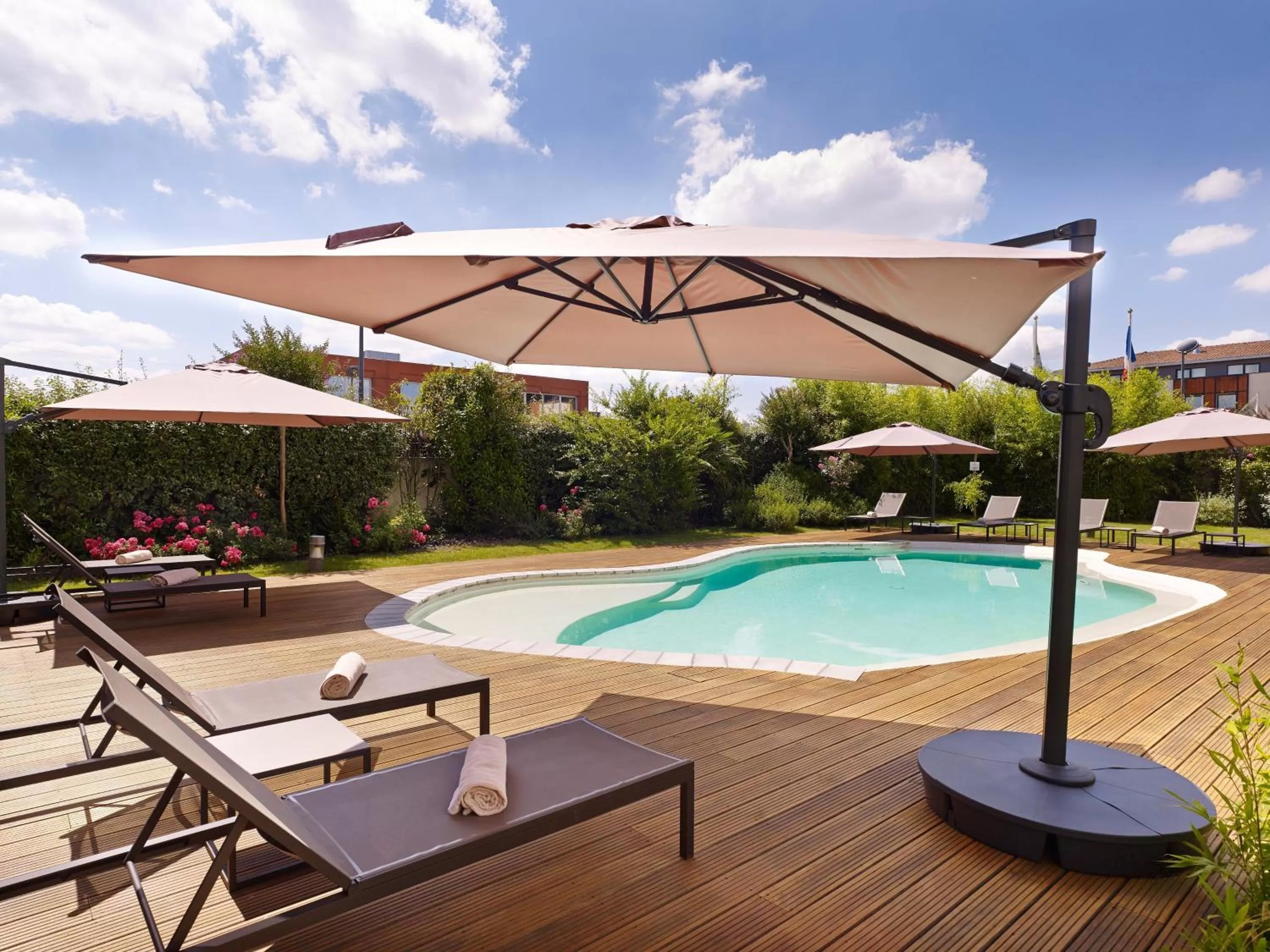 Swimming pool in Holiday Inn Express Toulouse Airport by IHG