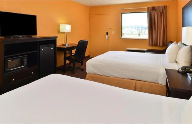 Bed in Americas Best Value Inn Byram
