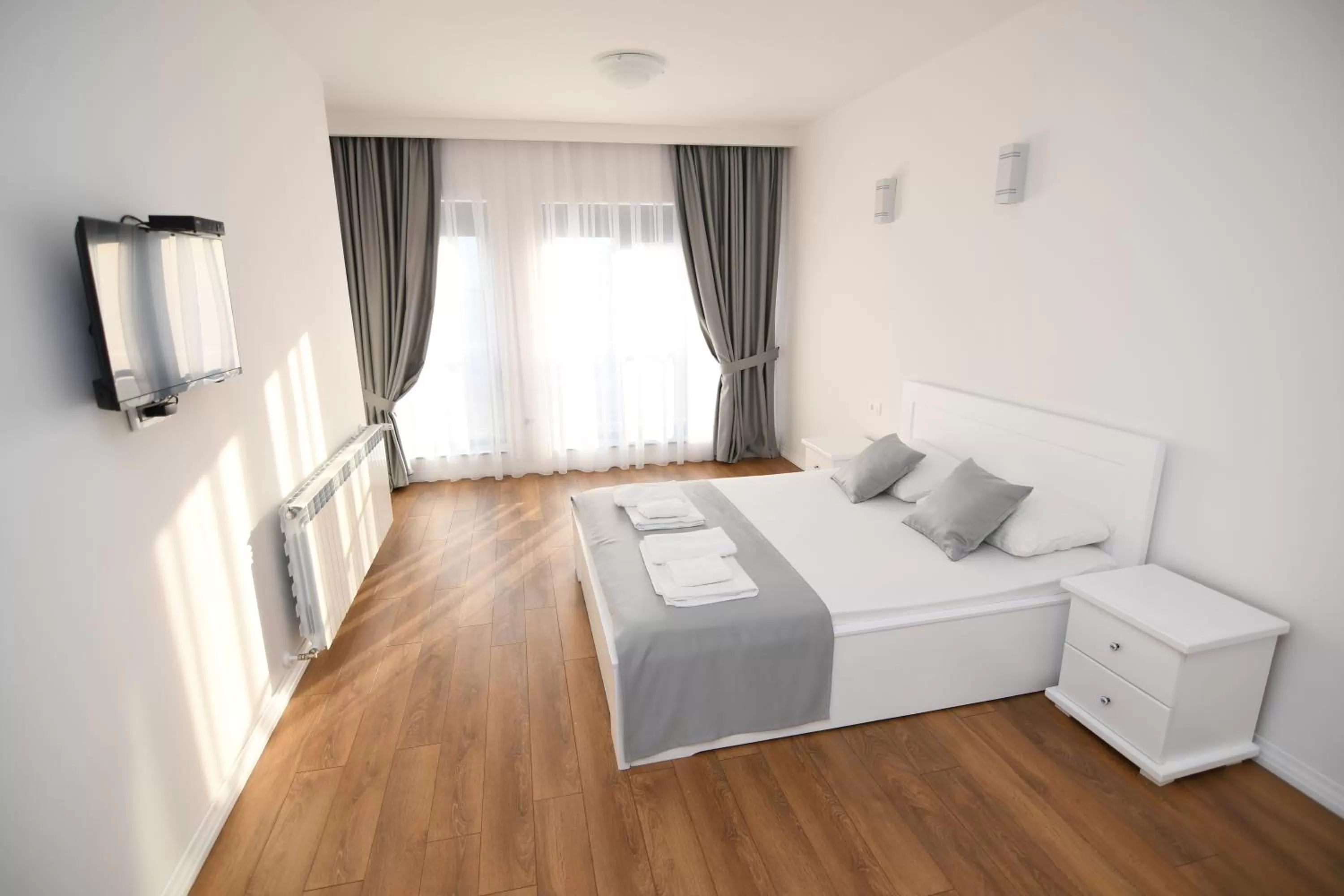 Bed in Elan Luxury Apartments & Lounge Bar