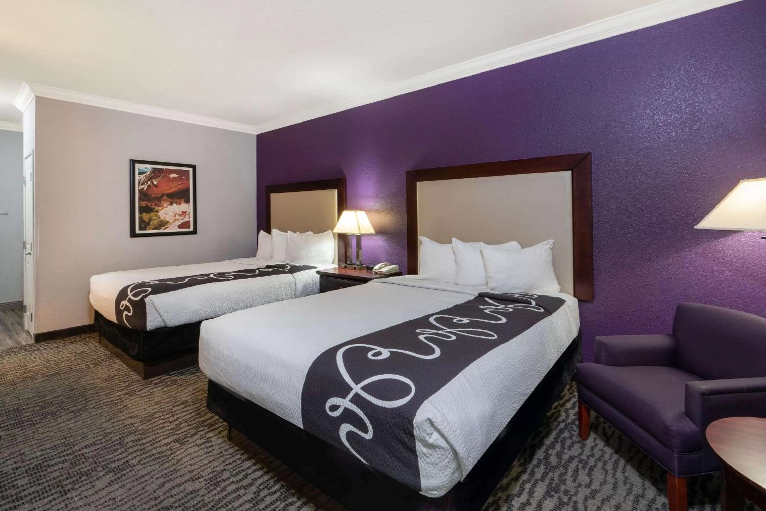 Bed in La Quinta Inn & Suites by Wyndham Loveland Estes Park