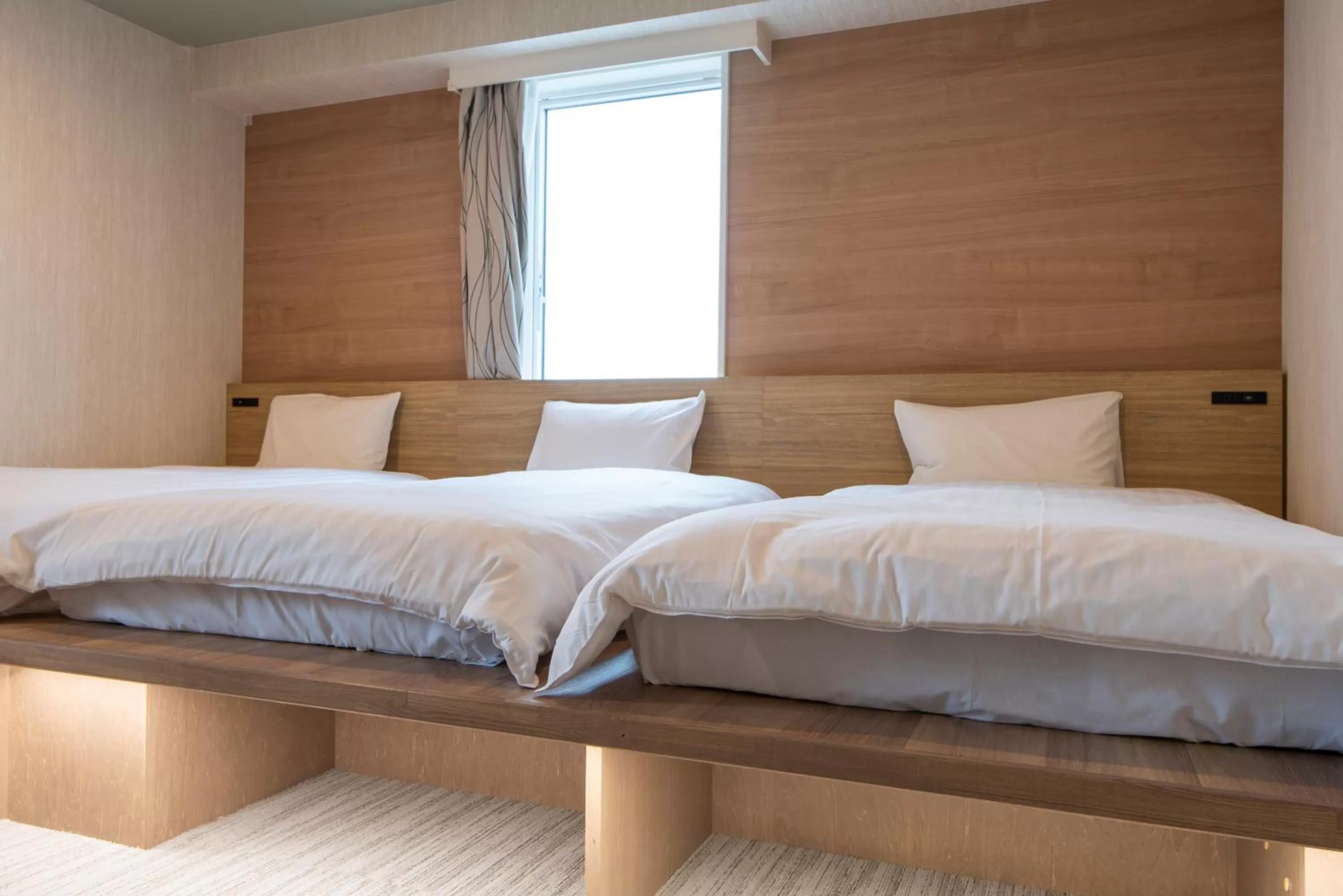 Bed in HOTEL AMANEK Asahikawa