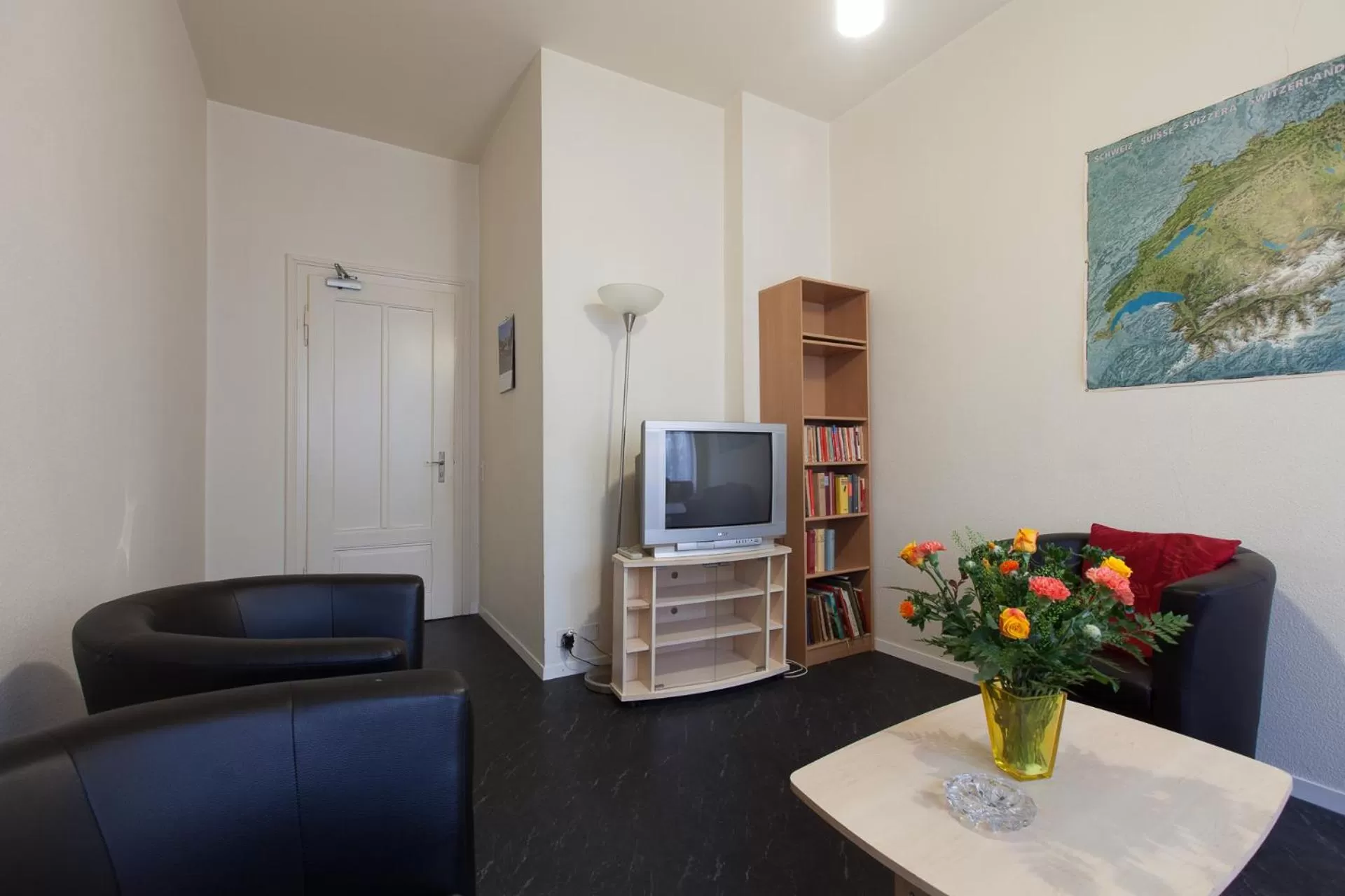 Communal lounge/ TV room in Hotel Alpha